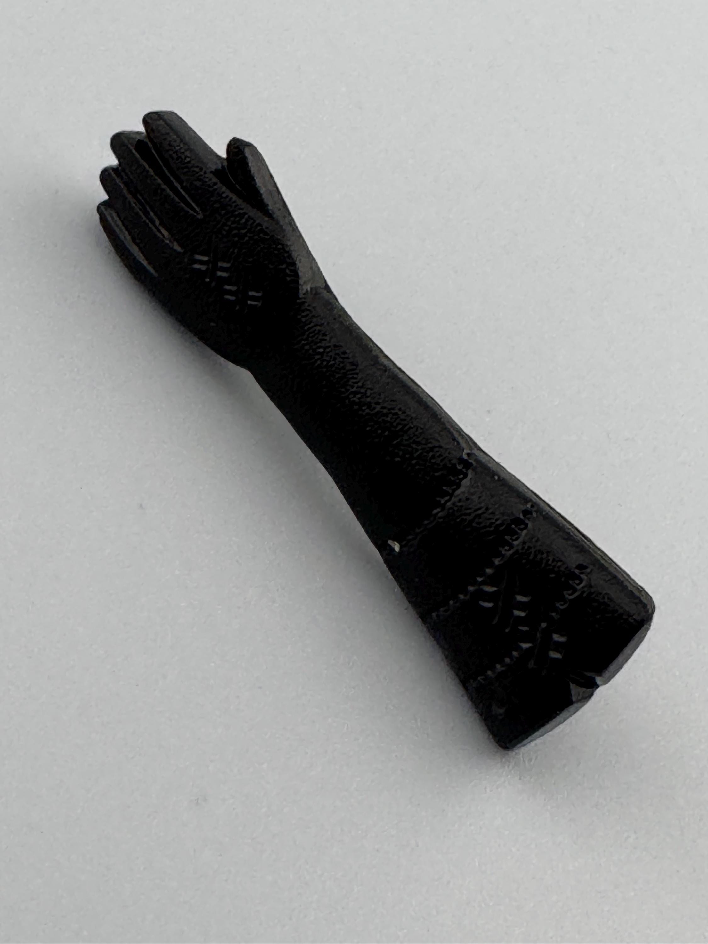 antique Czech figa hand brooch in black moulded glass