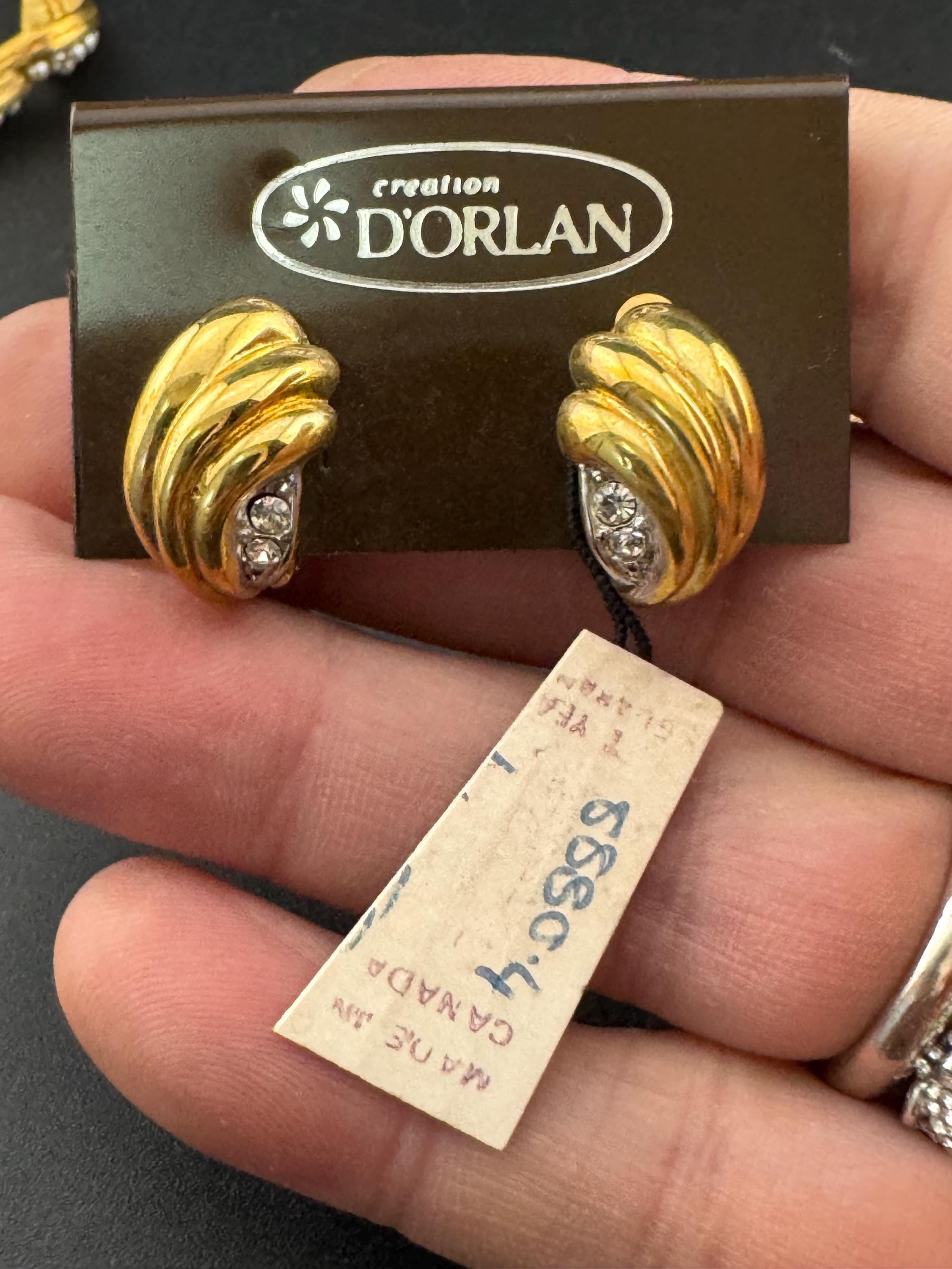 Vintage D’orlan Canada designer large 22ct triple gold plated and clear Swarovski Crystal abstract swirl clip on earrings
