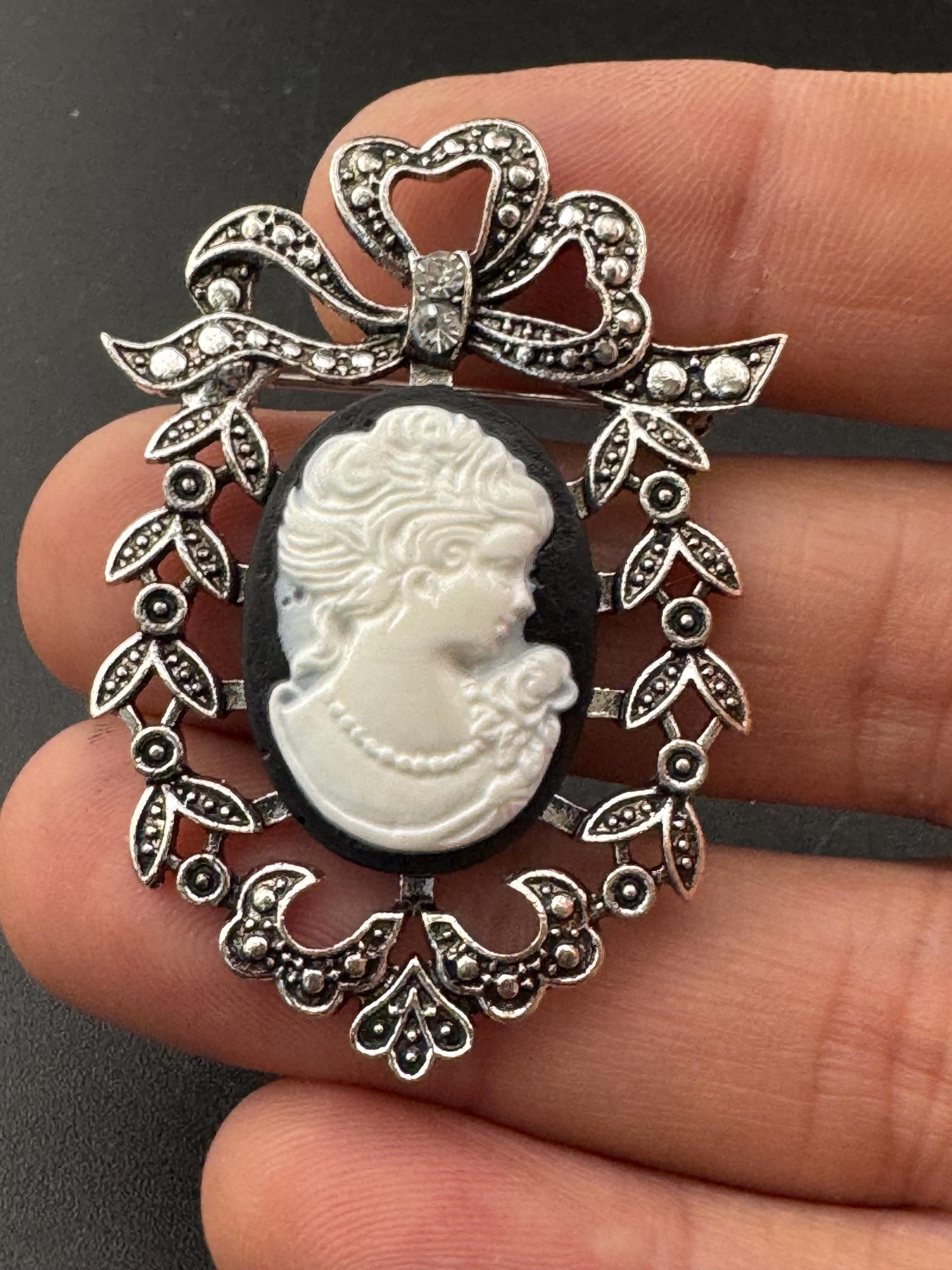 Vintage style handmade black and white cameo brooch with antique silver tone ornate frame