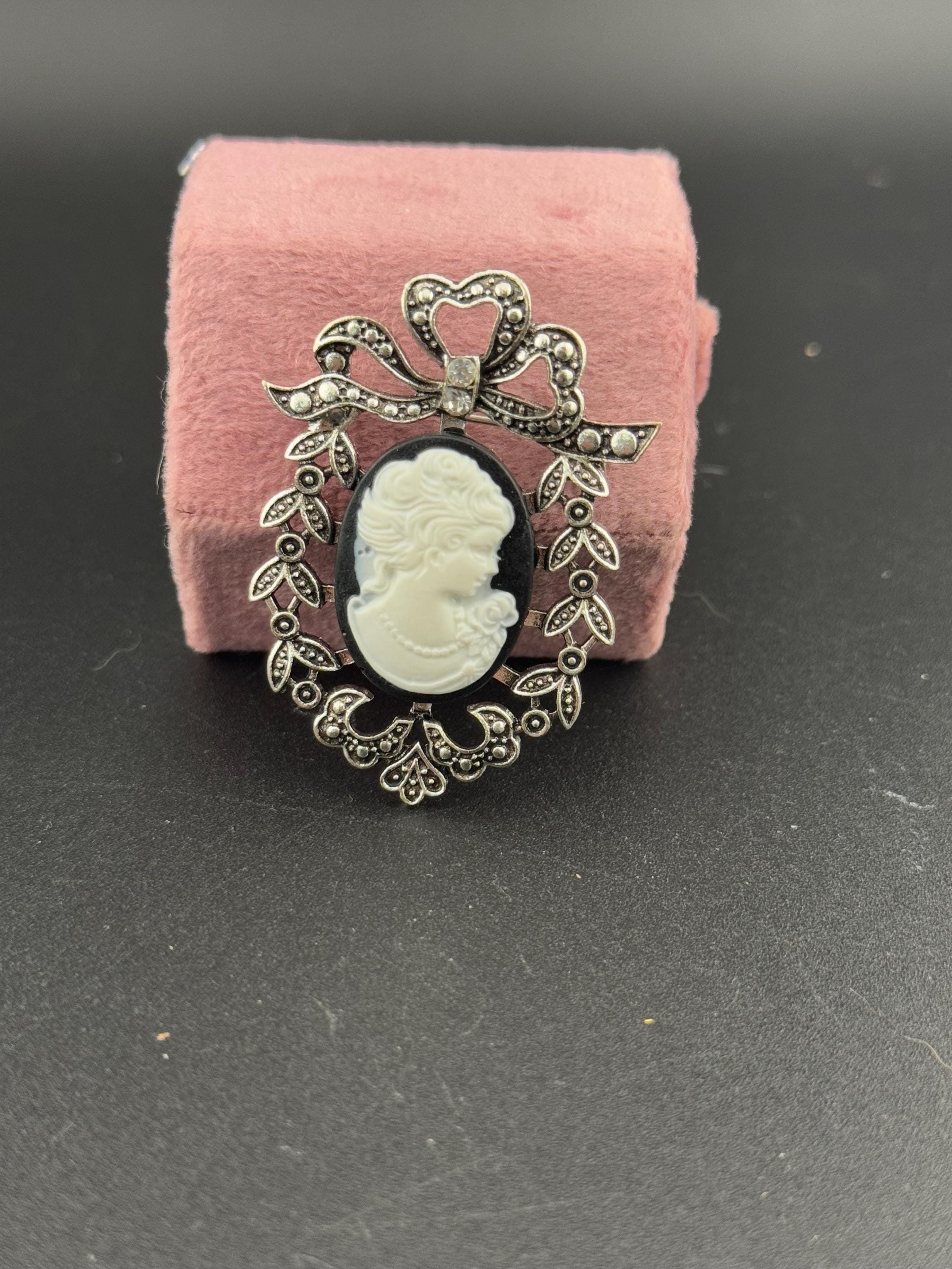 Vintage style handmade black and white cameo brooch with antique silver tone ornate frame