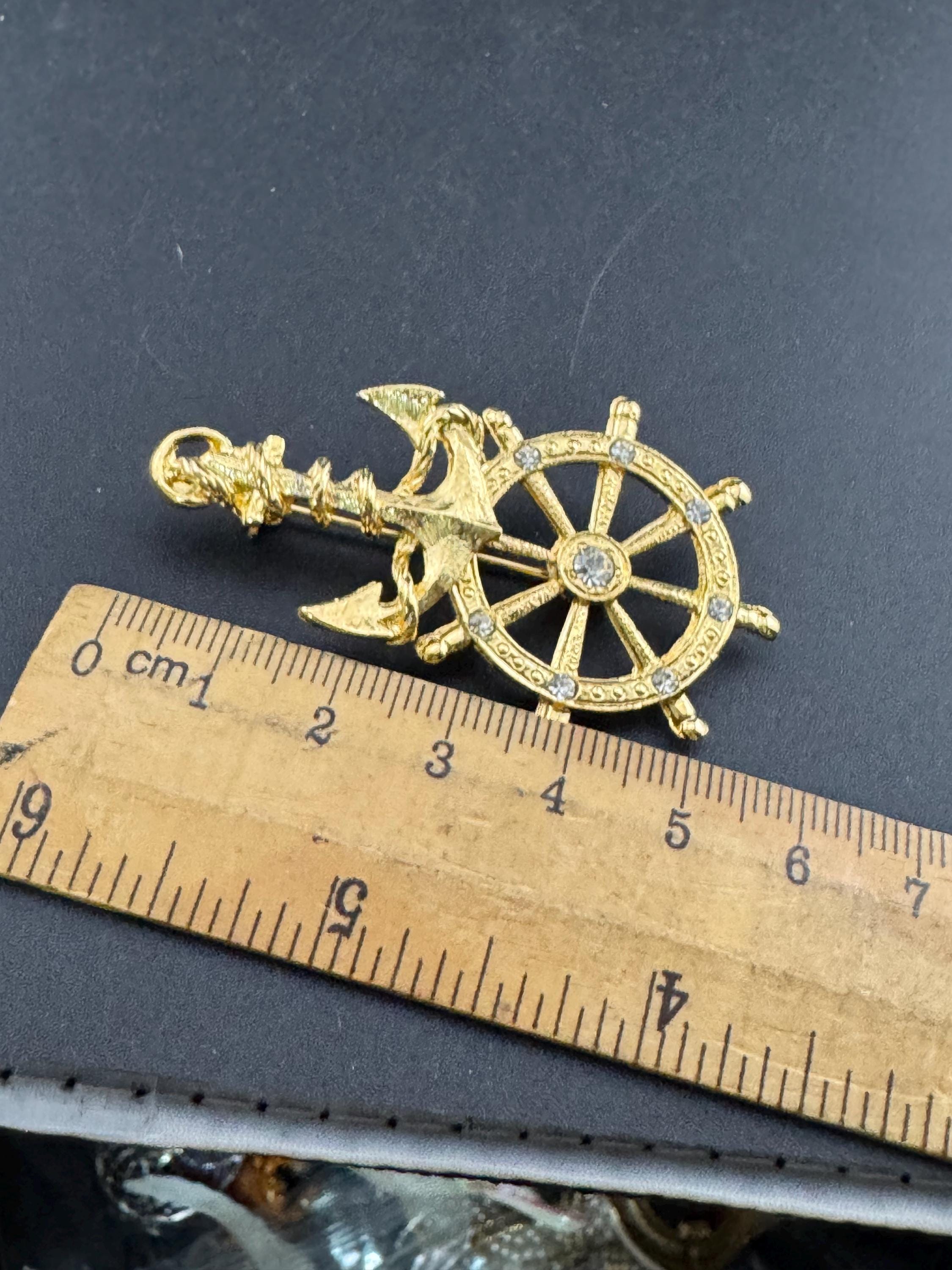 Vintage nautical gold tone clear diamanté crystal ships wheel and anchor Brooch 1980s 1990s seaside seafaring captain ship boat