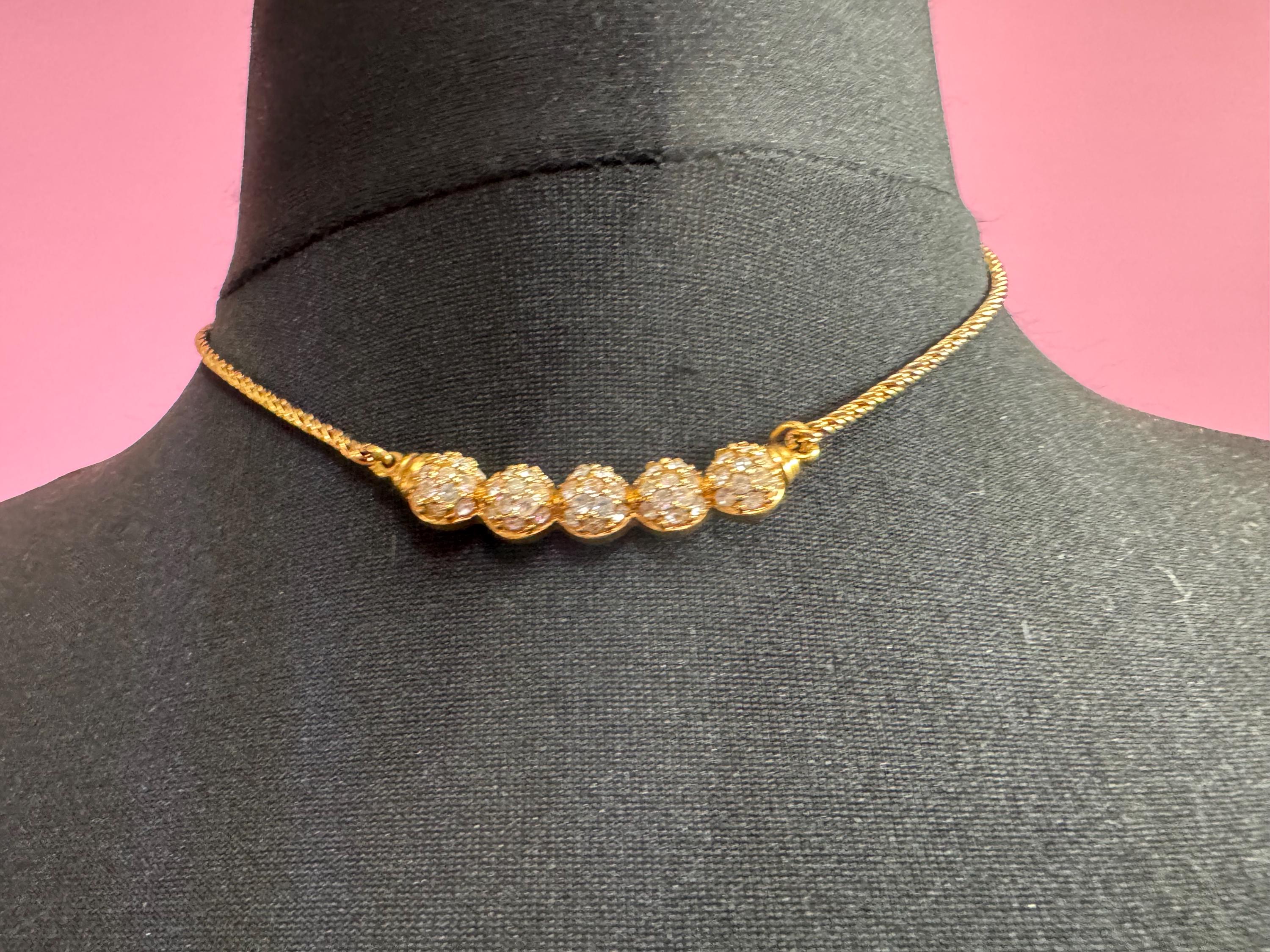 Signed Swarovski gold tone clear ball link crystal diamanté necklace