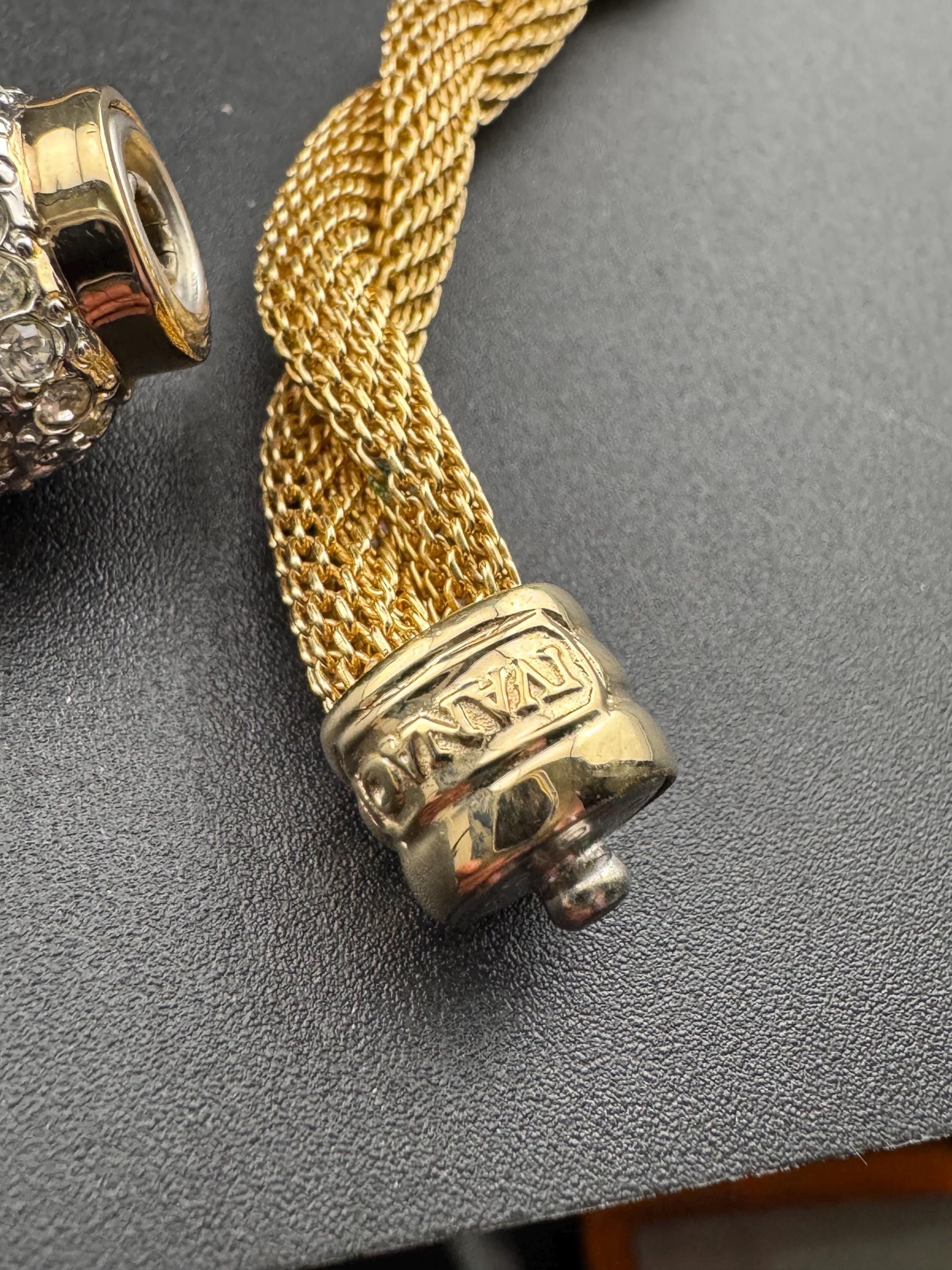 Signed IVANA Trump modernist and versatile gold tone wide mesh choker necklace with clear diamanté detail and popper clasp