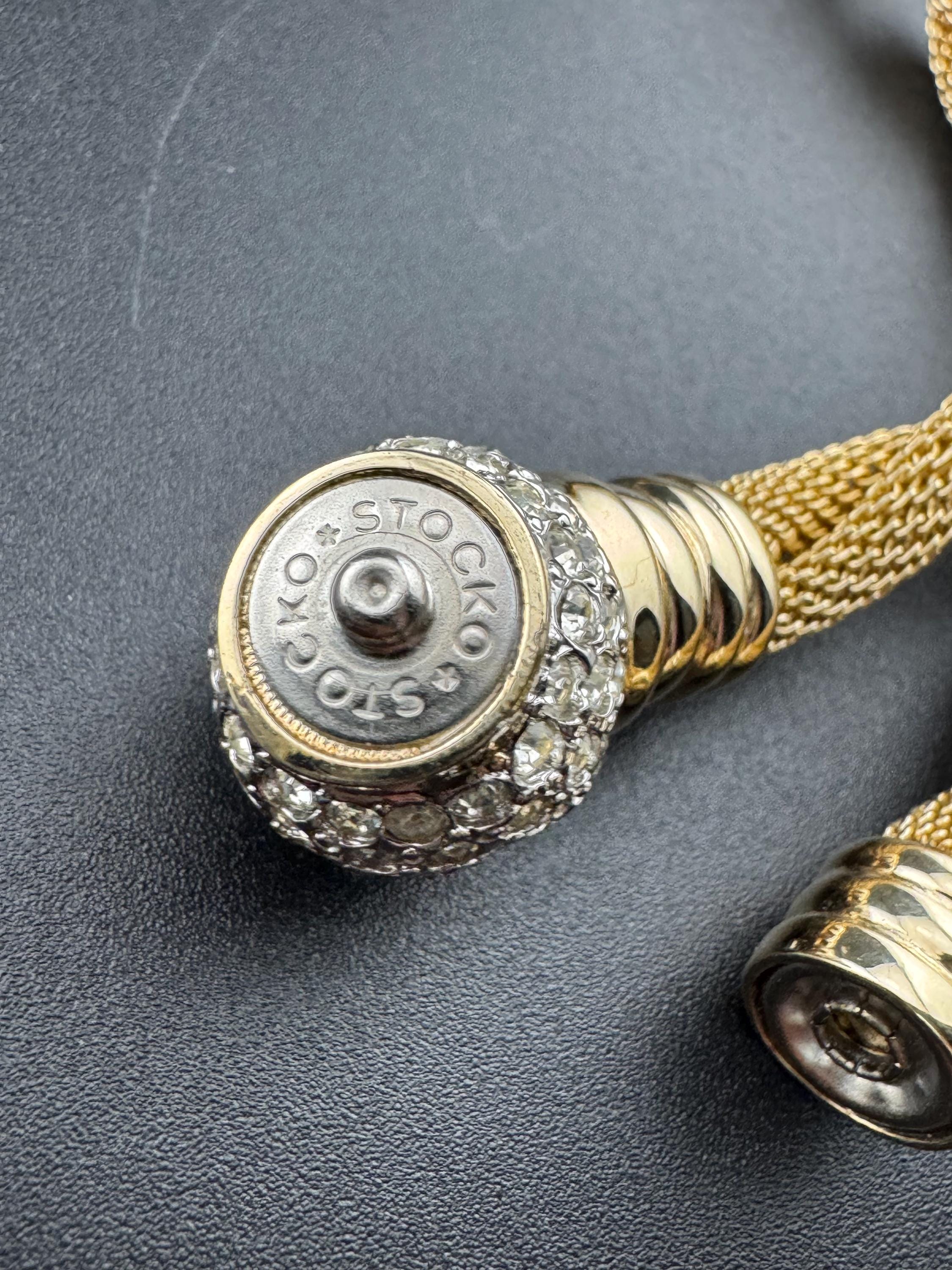 Signed IVANA Trump modernist and versatile gold tone wide mesh choker necklace with clear diamanté detail and popper clasp