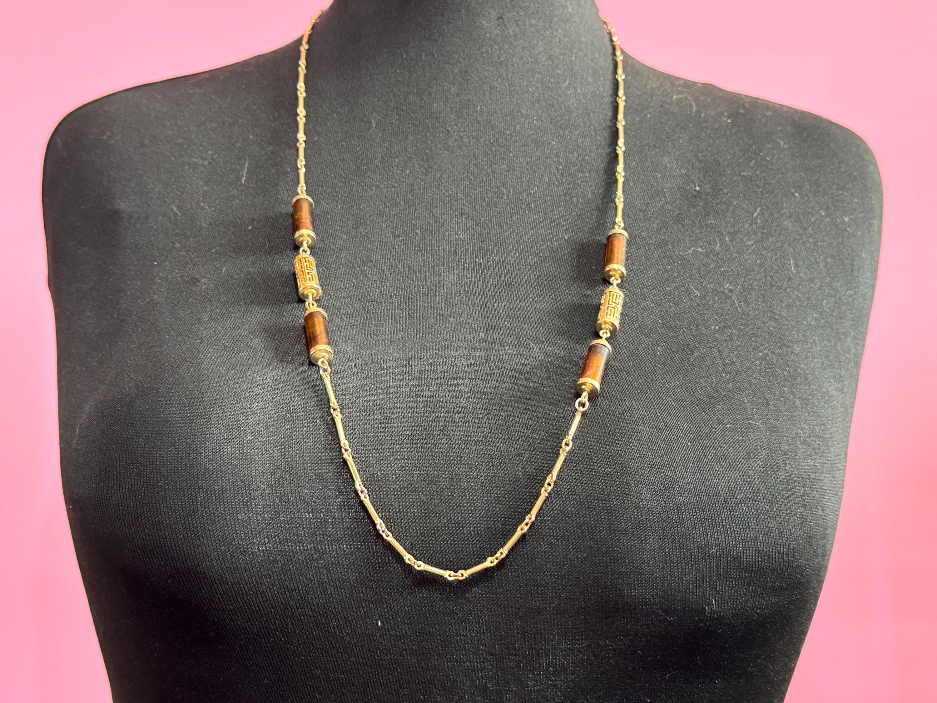 Vintage Sarah Coventry signed long gold tone station Chinese caged brown tube bead chain necklace 1960s 1970s