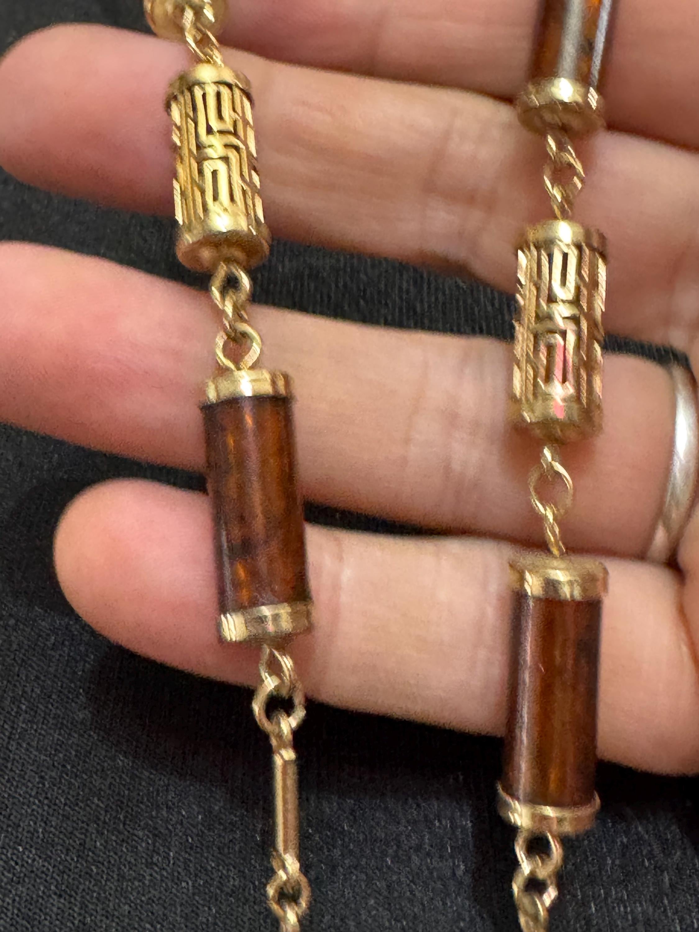 Vintage Sarah Coventry signed long gold tone station Chinese caged brown tube bead chain necklace 1960s 1970s