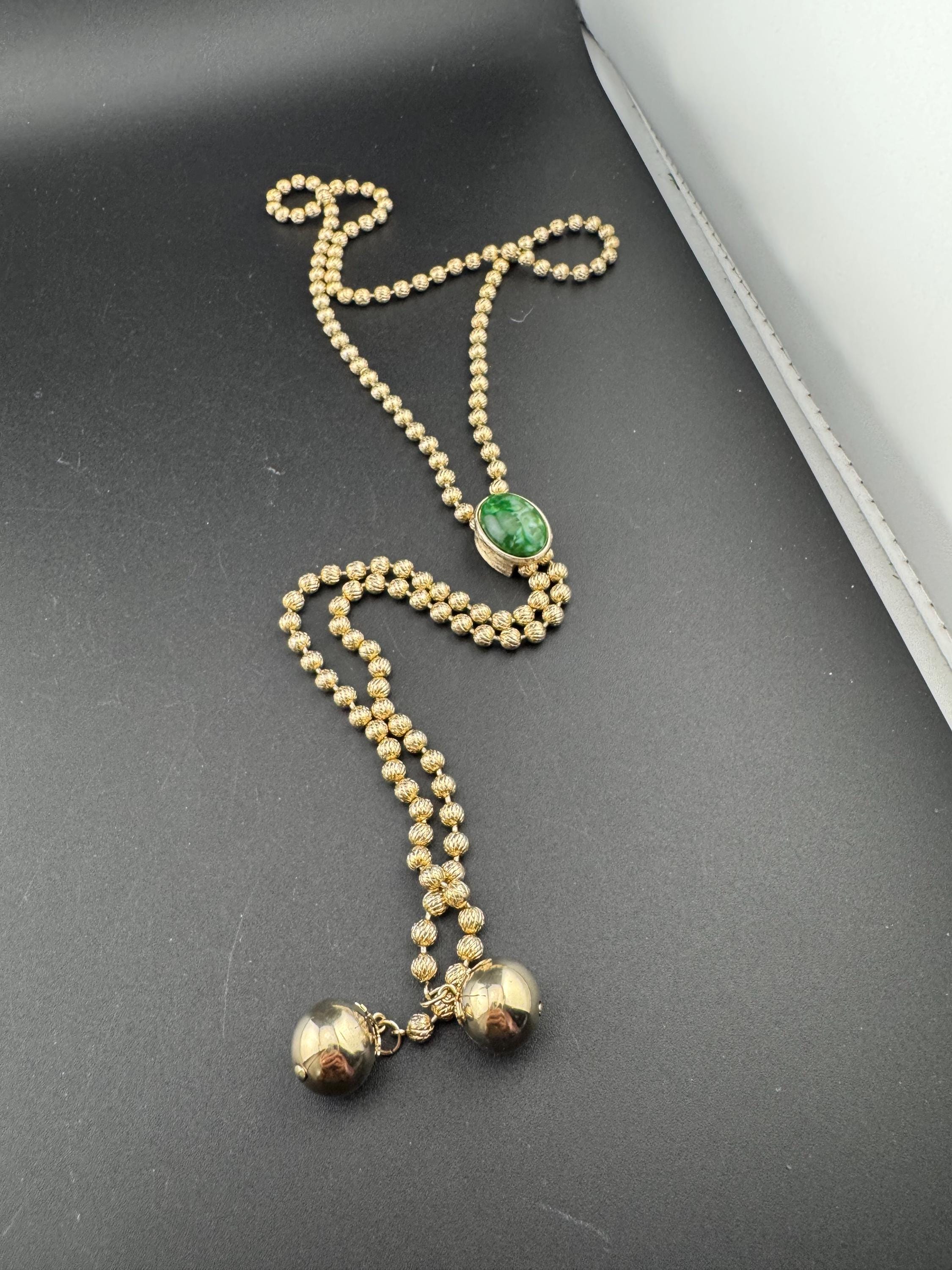 Signed Sarah Coventry gold tone ball bead chain drop tassel bolo necklace with green cabochon adjustable length
