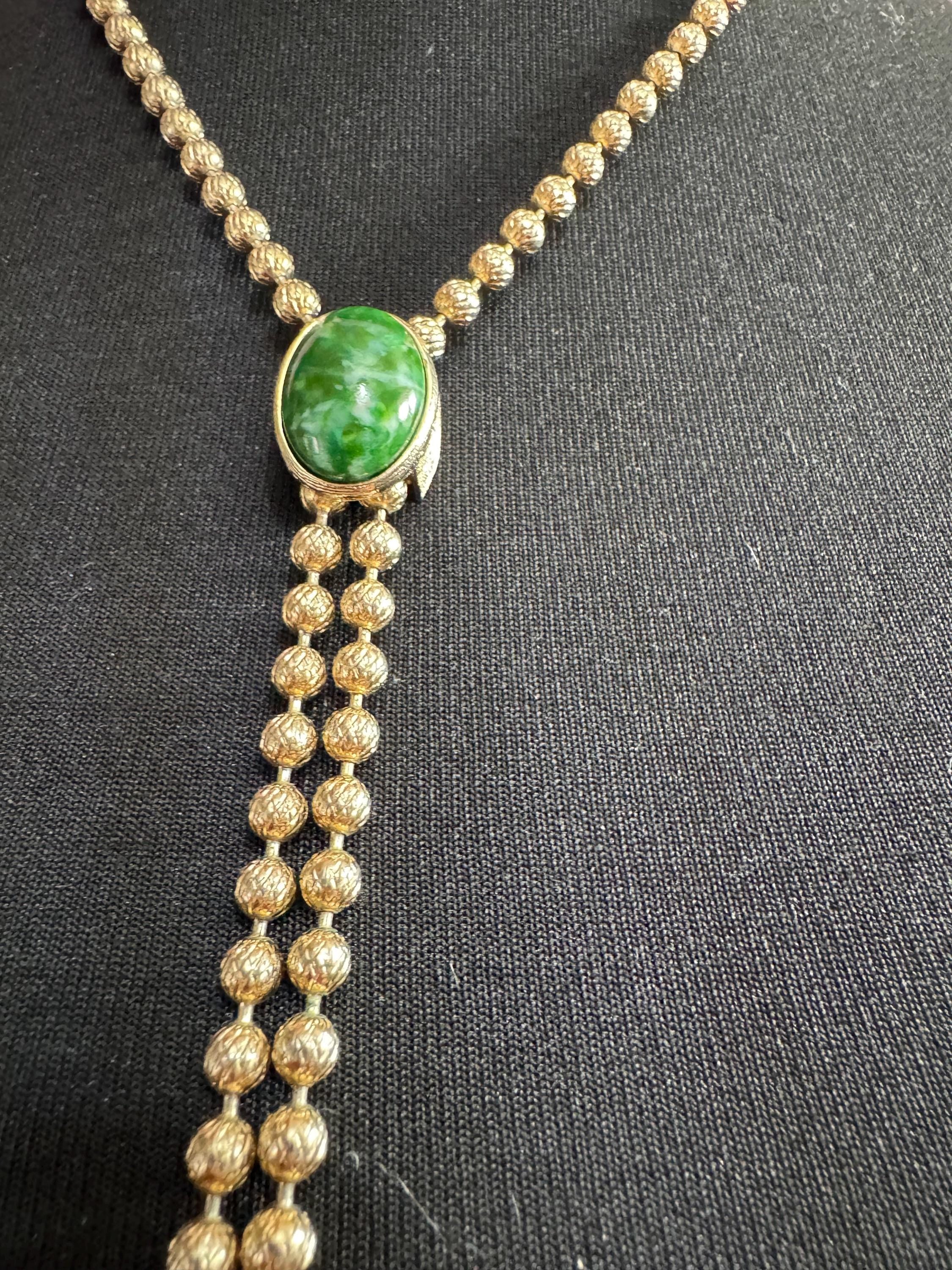 Signed Sarah Coventry gold tone ball bead chain drop tassel bolo necklace with green cabochon adjustable length