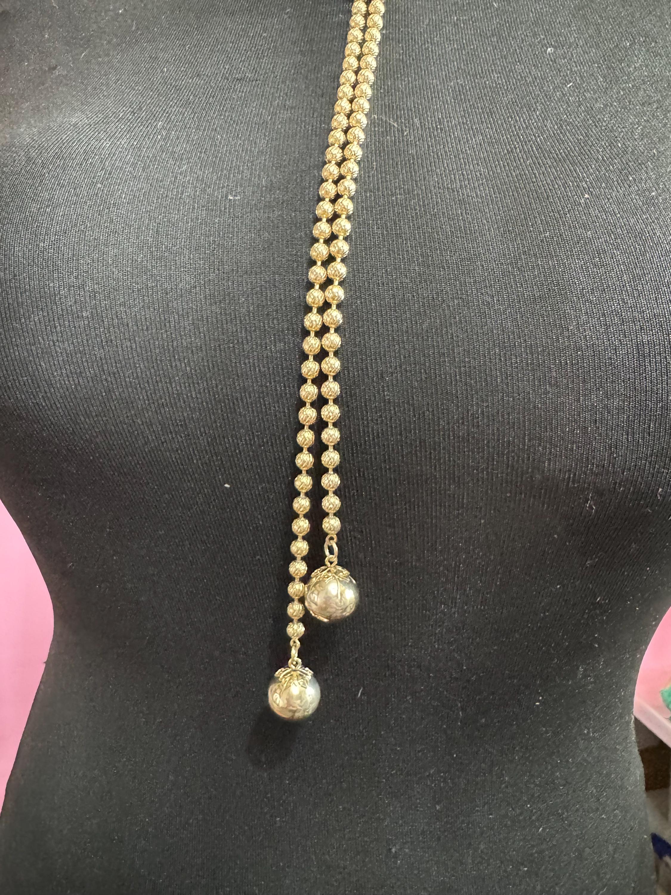 Signed Sarah Coventry gold tone ball bead chain drop tassel bolo necklace with green cabochon adjustable length
