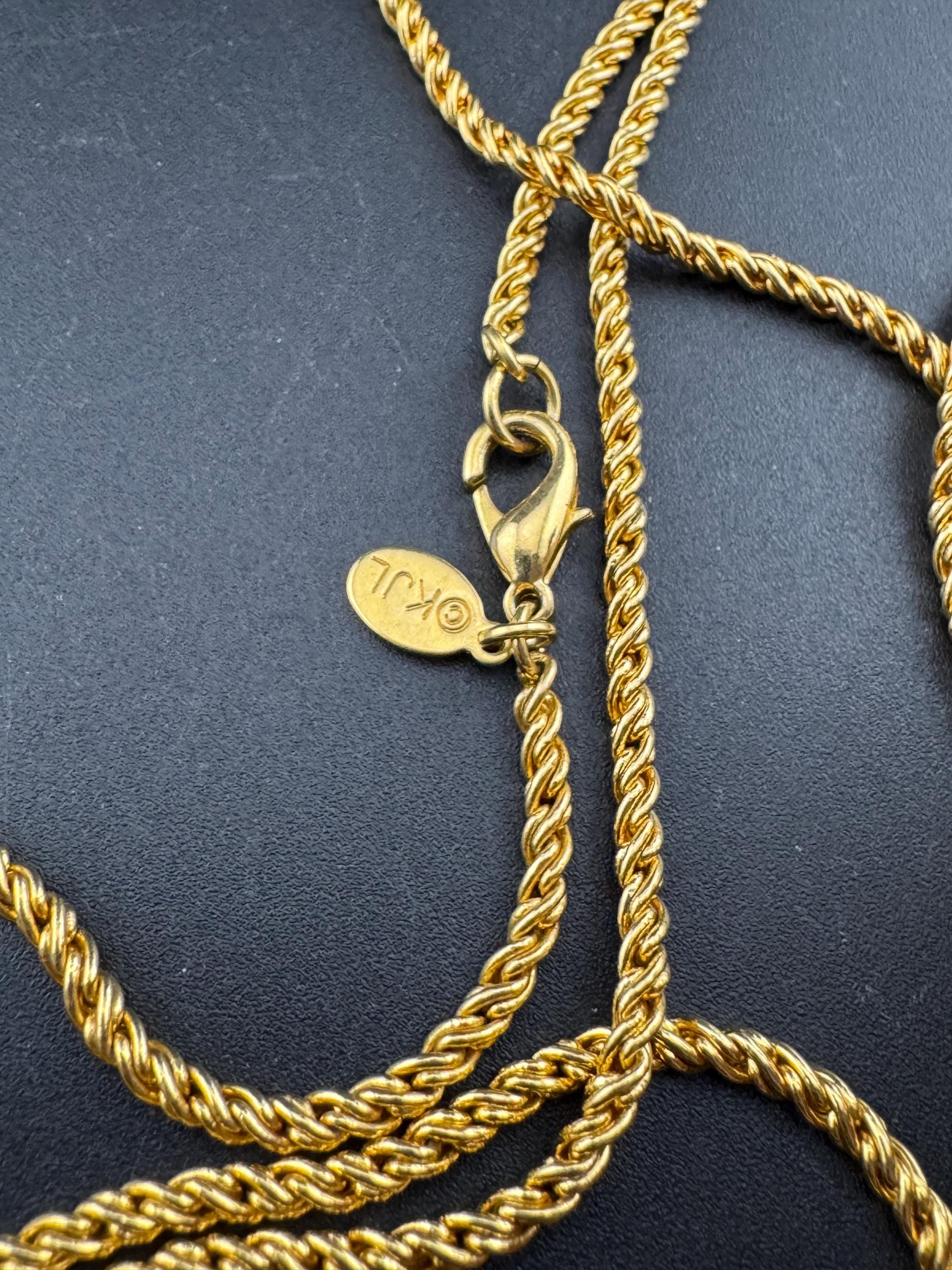 Signed Kirk’s Folly man in the moon ball pendant watch on a 86cm Kenneth lane gold plated long chain