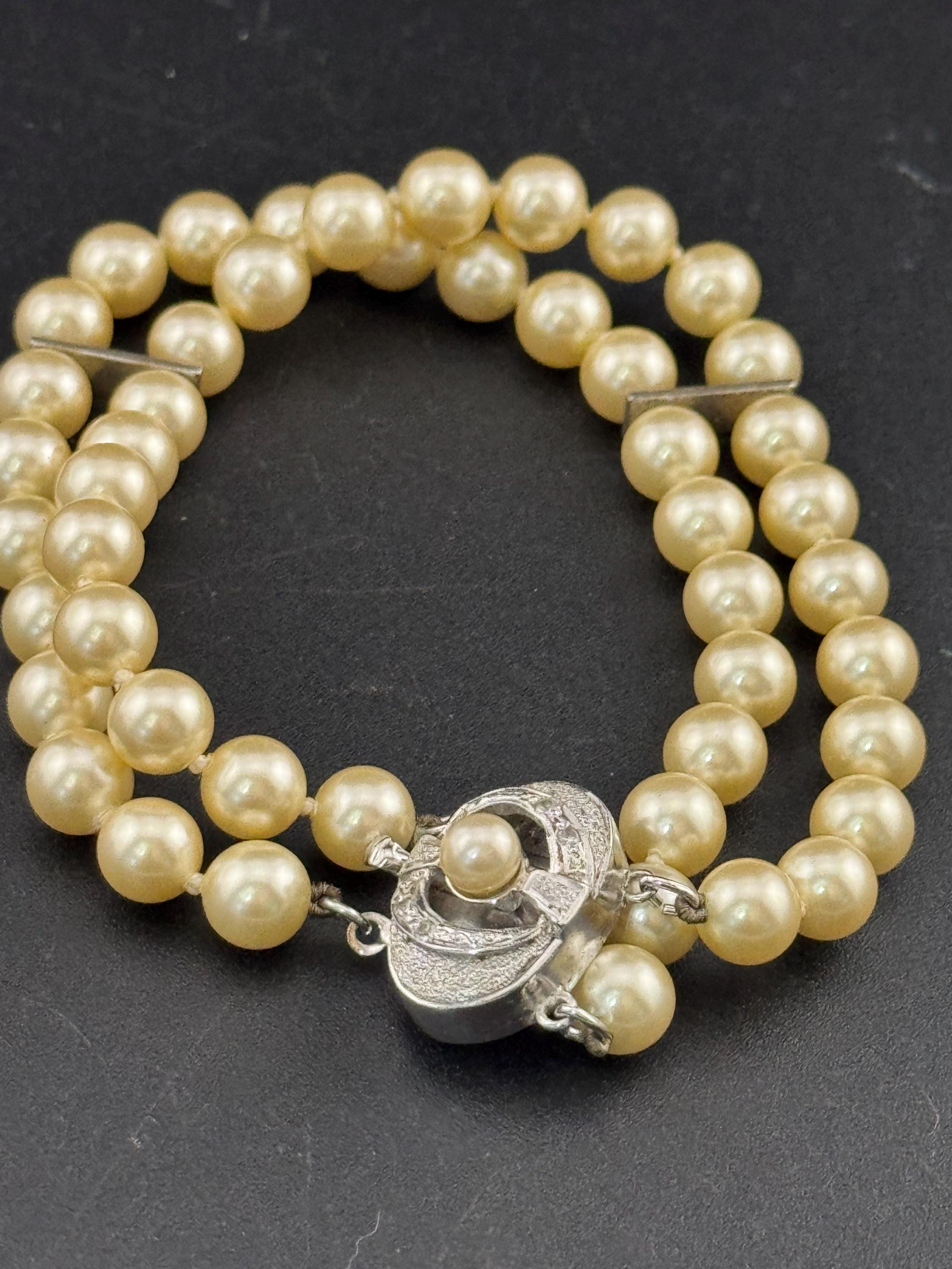 Vintage Sterling 925 Silver knotted faux pearl double row bracelet with ornate clasp with seahorse and starfish logo on
