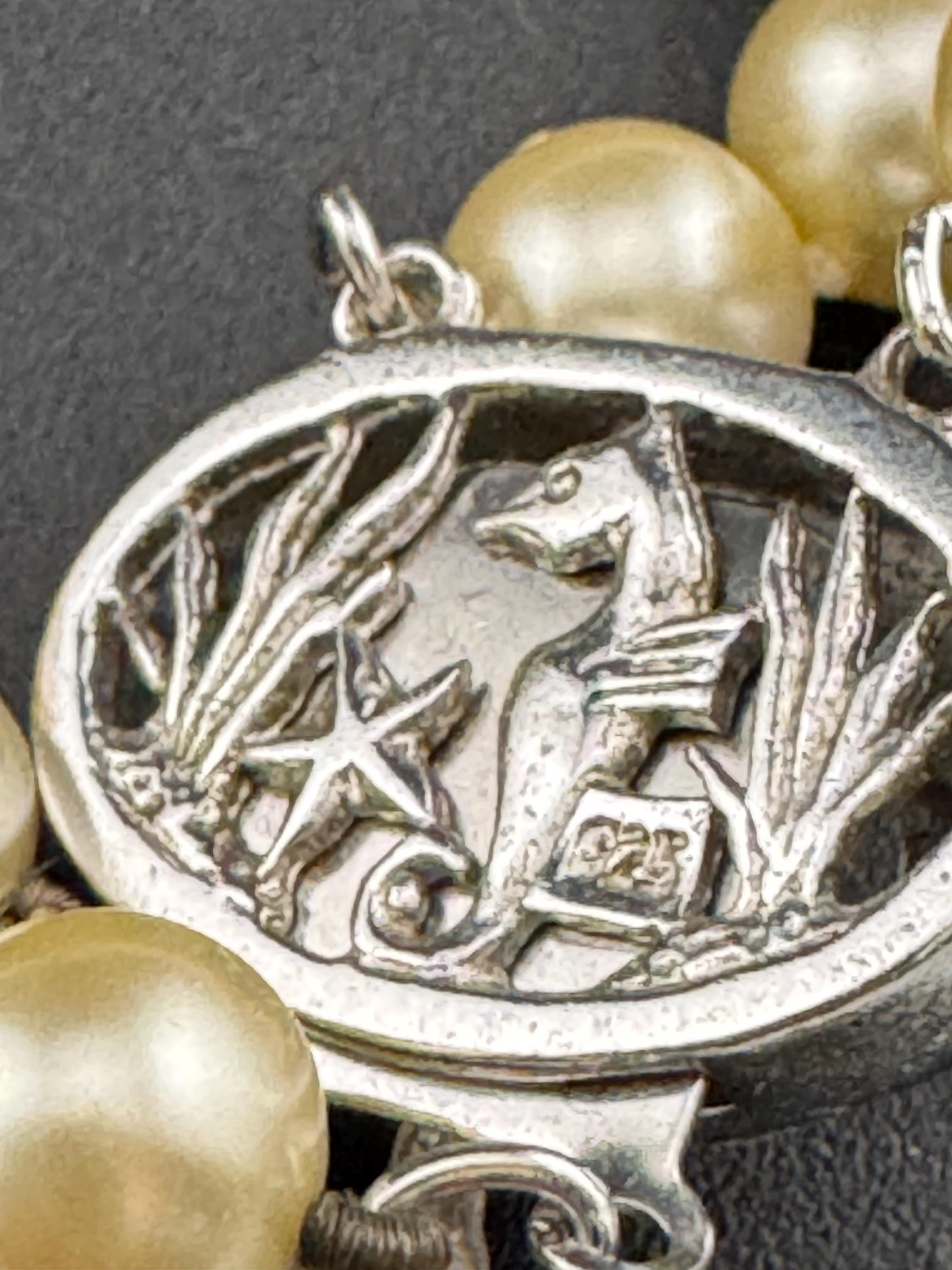 Vintage Sterling 925 Silver knotted faux pearl double row bracelet with ornate clasp with seahorse and starfish logo on
