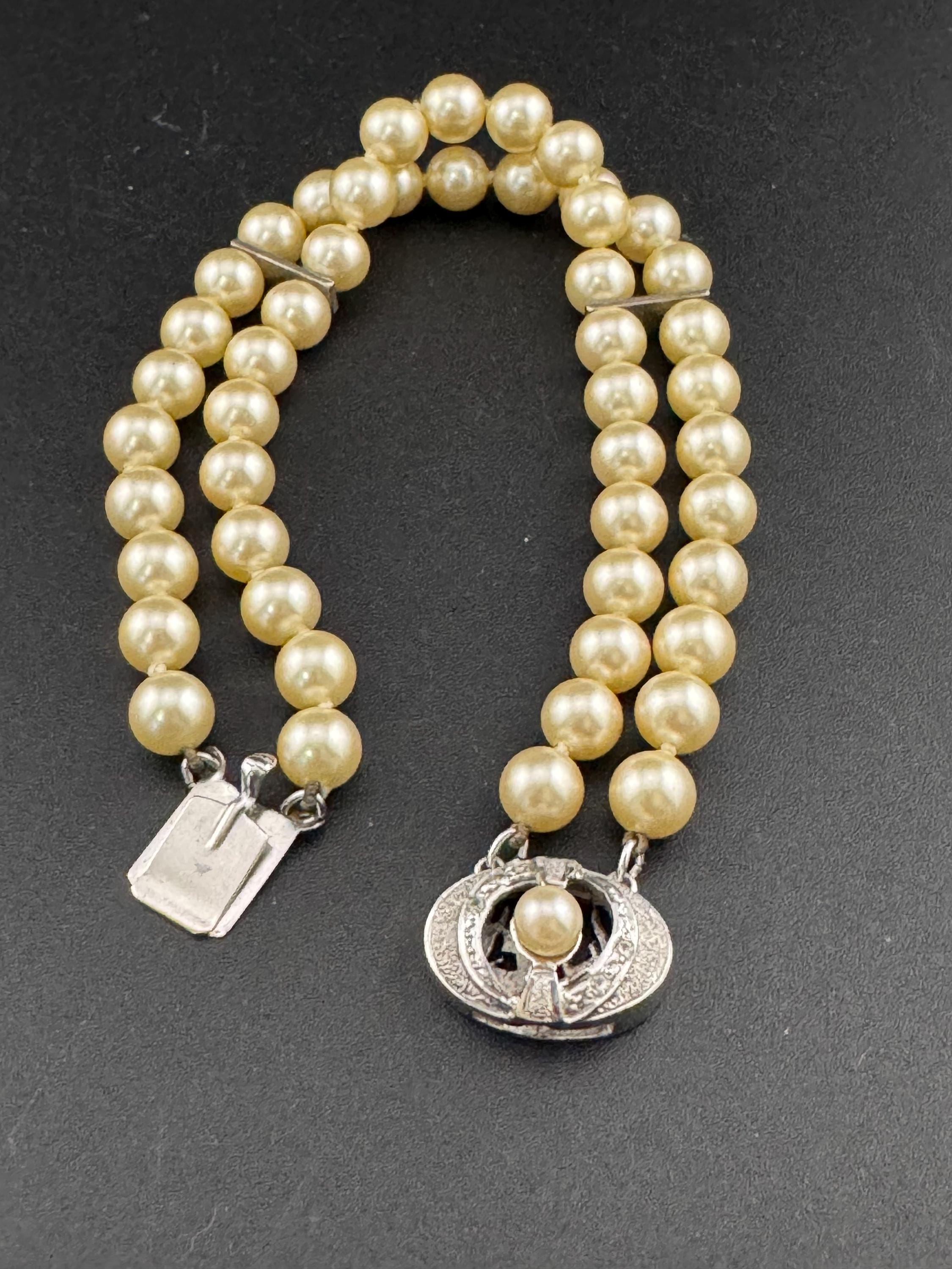 Vintage Sterling 925 Silver knotted faux pearl double row bracelet with ornate clasp with seahorse and starfish logo on