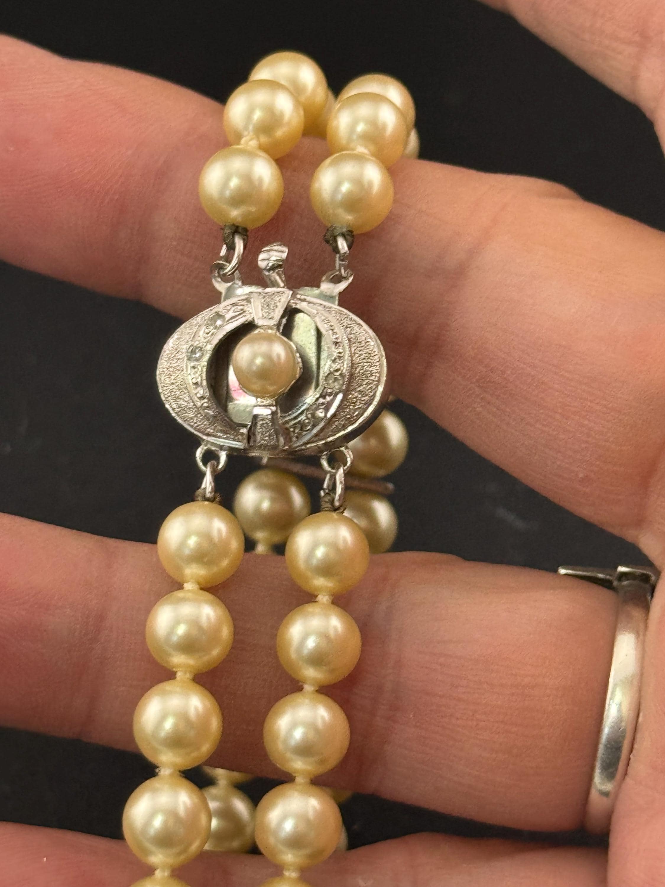 Vintage Sterling 925 Silver knotted faux pearl double row bracelet with ornate clasp with seahorse and starfish logo on