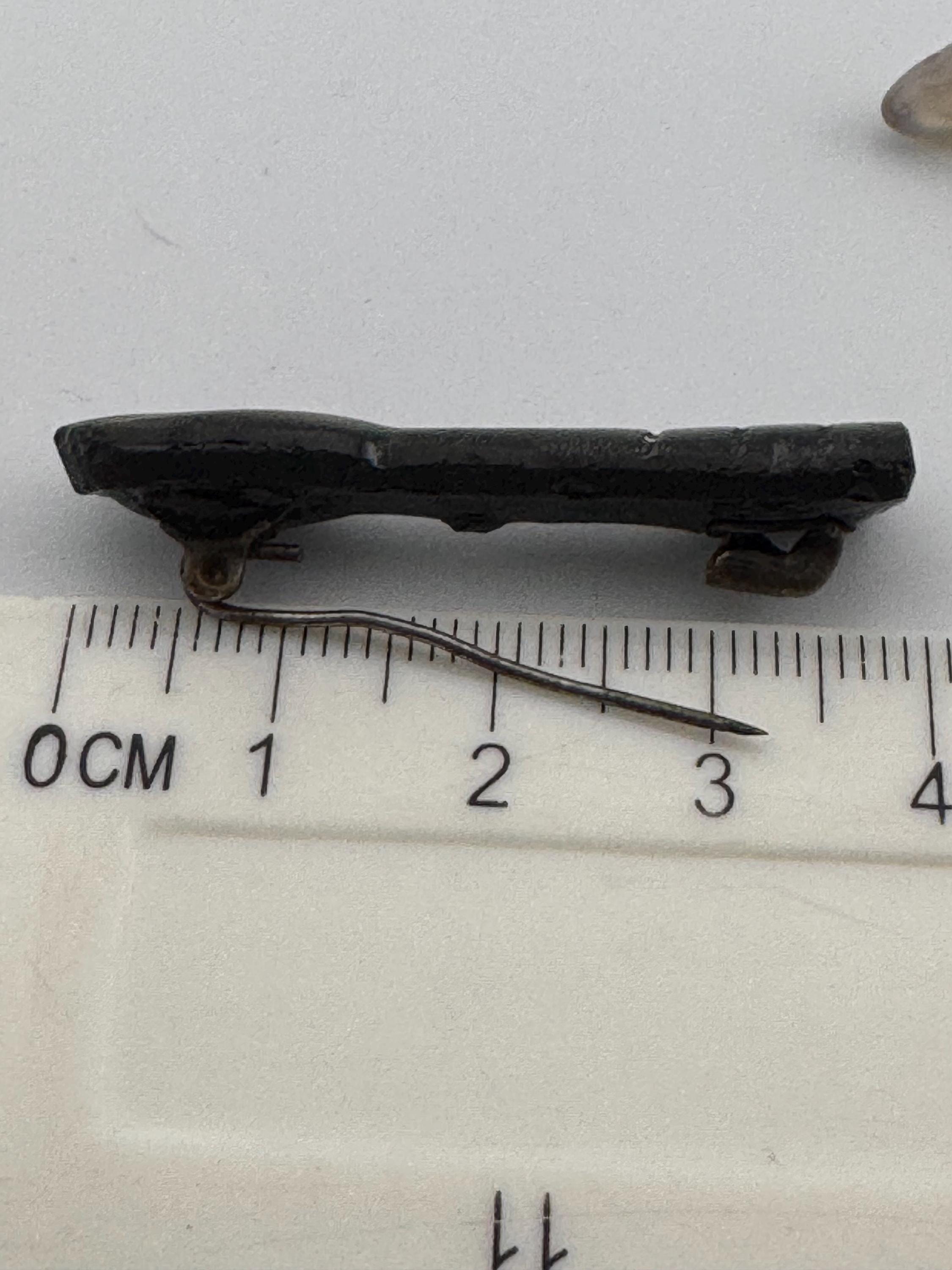 antique Czech figa hand brooch in black moulded glass