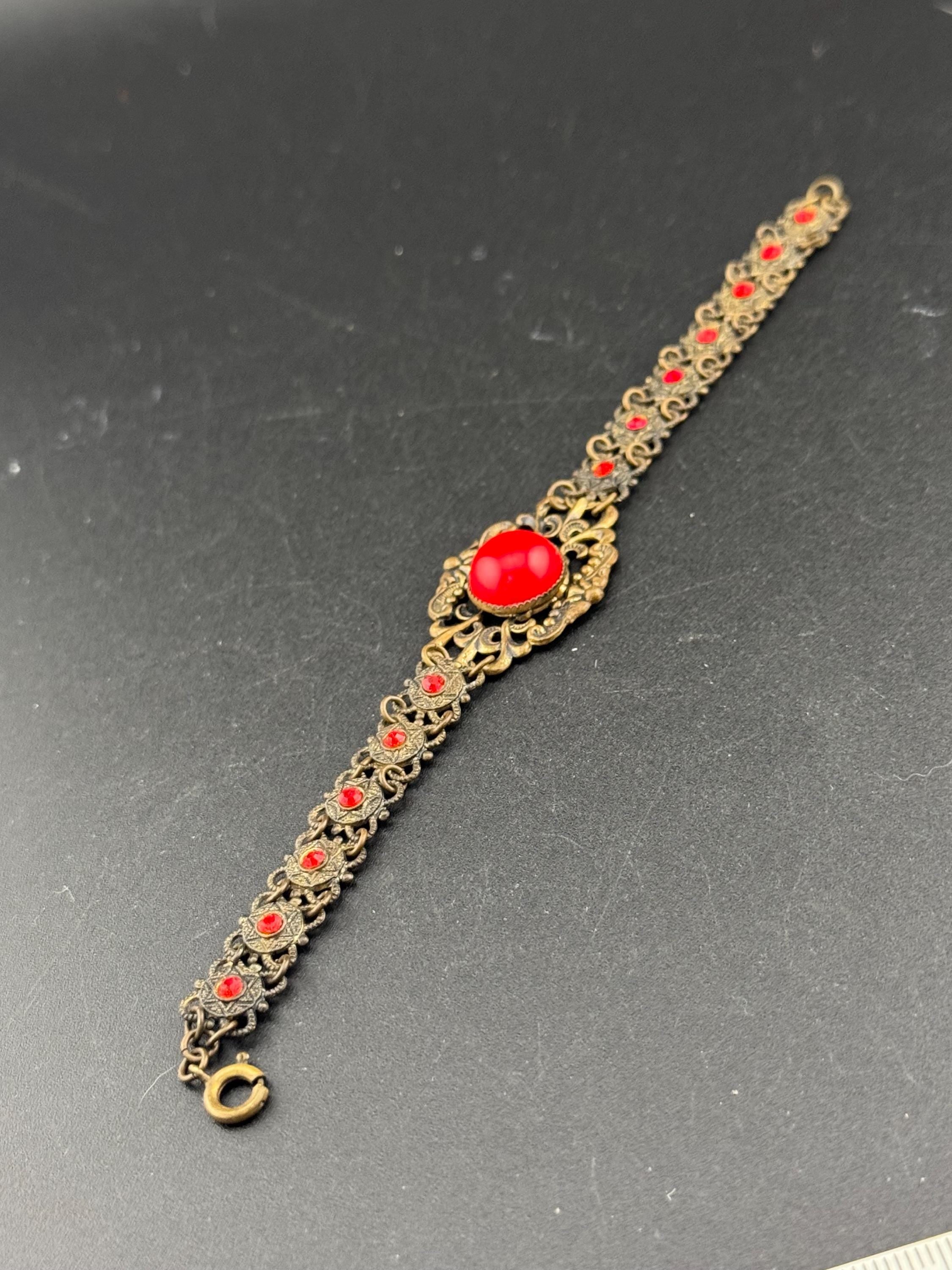 Vintage Czech Filigree Bracelet: Gold Tone Brass, Ruby Rhinestone, Red Cabochon