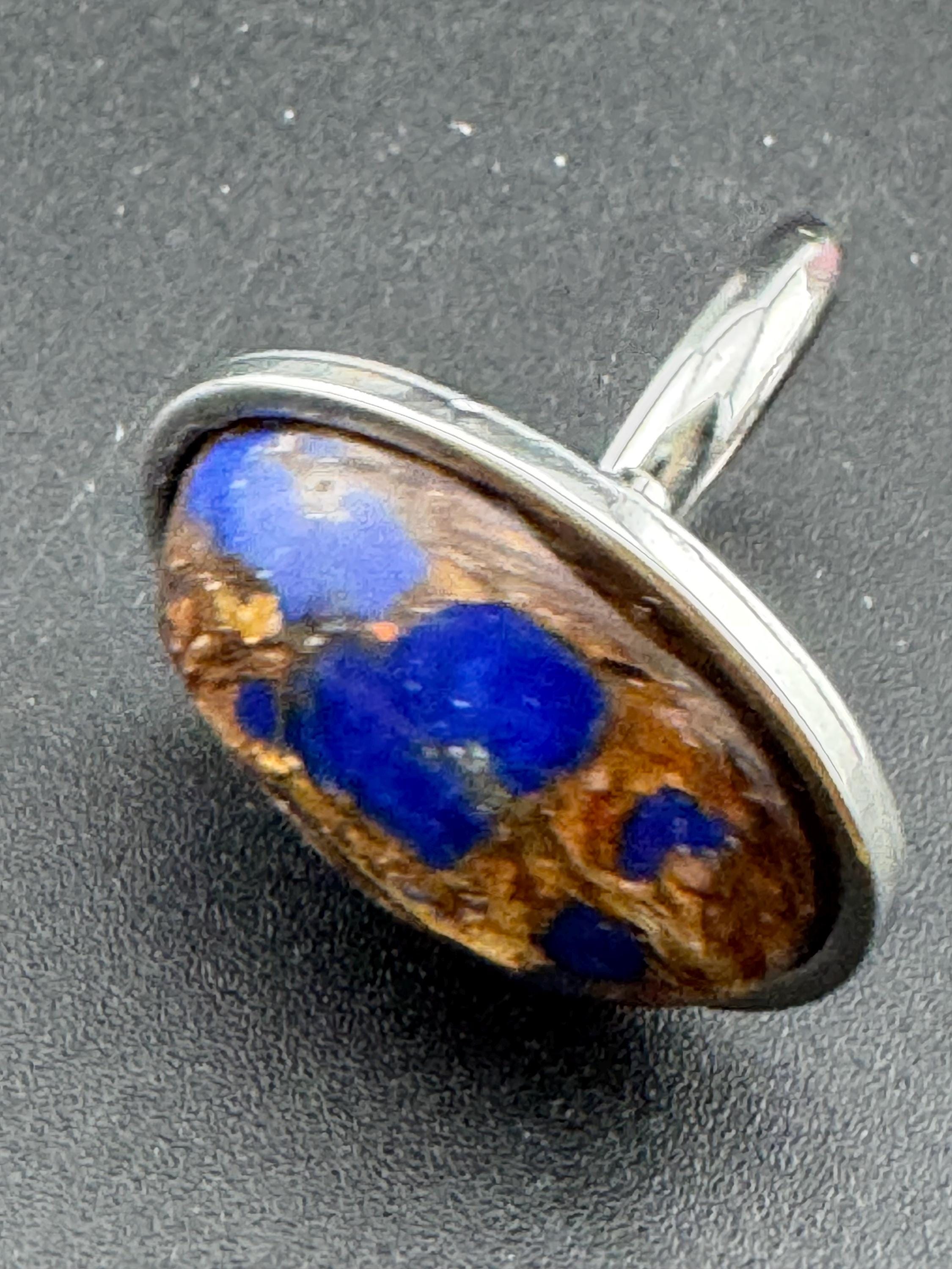 Oversized oval lapis lazuli blue and brown gemstone dress ring in non tarnish stainless steel, adjustable fit