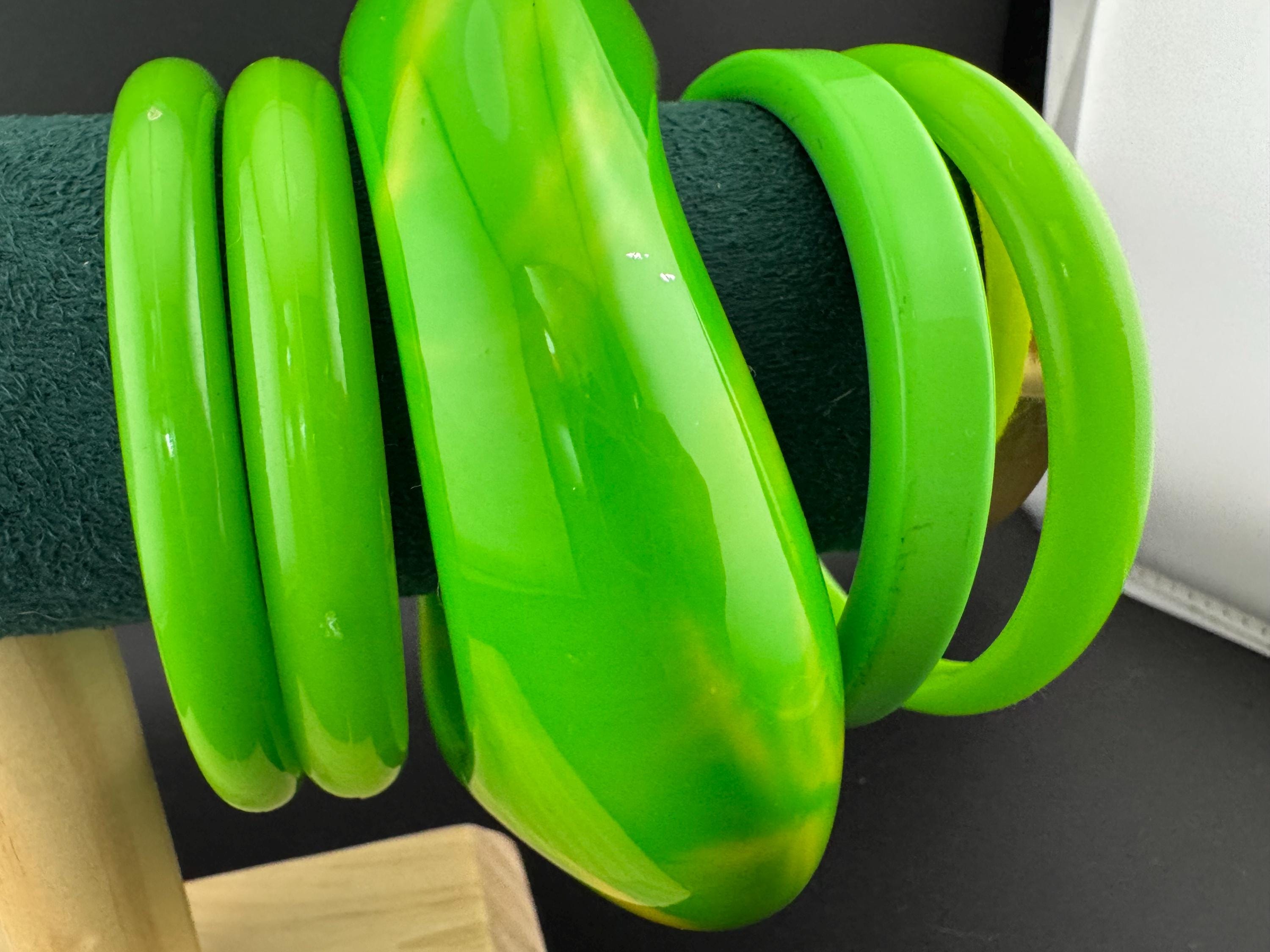 Vintage and retro curated stack of GREEN plastic acrylic bangles, bracelets