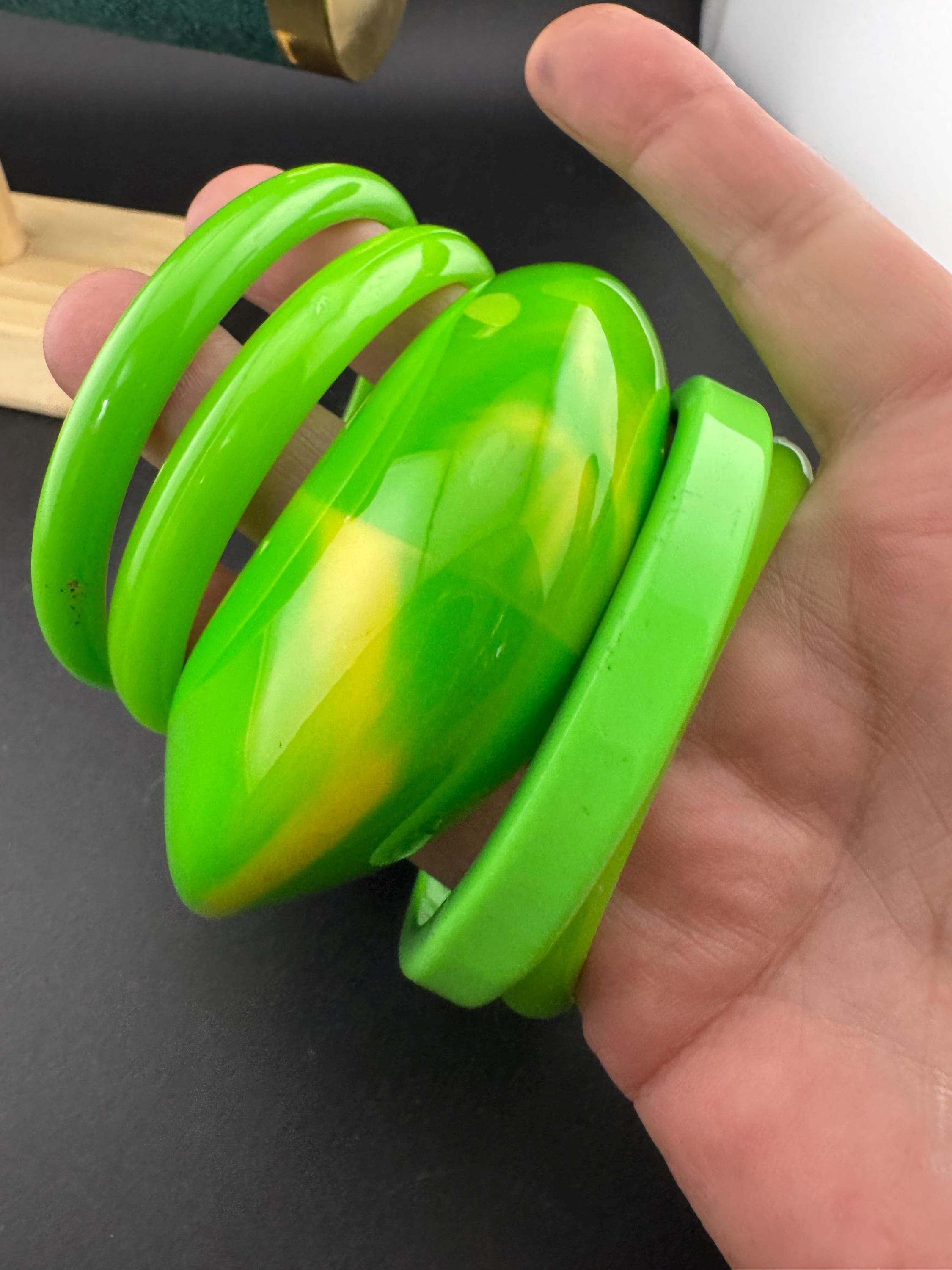 Vintage and retro curated stack of GREEN plastic acrylic bangles, bracelets
