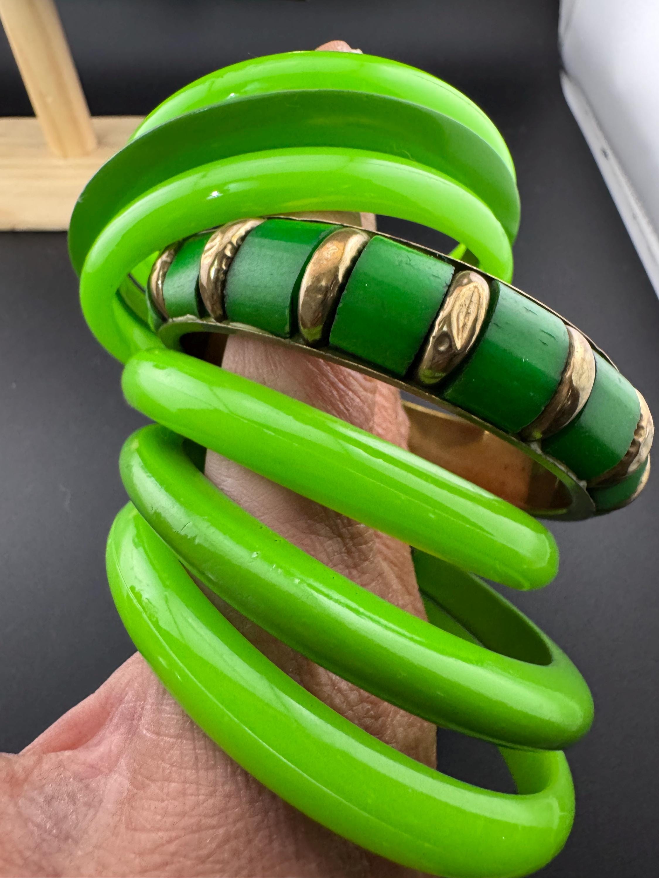 Vintage and retro curated stack of GREEN plastic acrylic bangles, bracelets