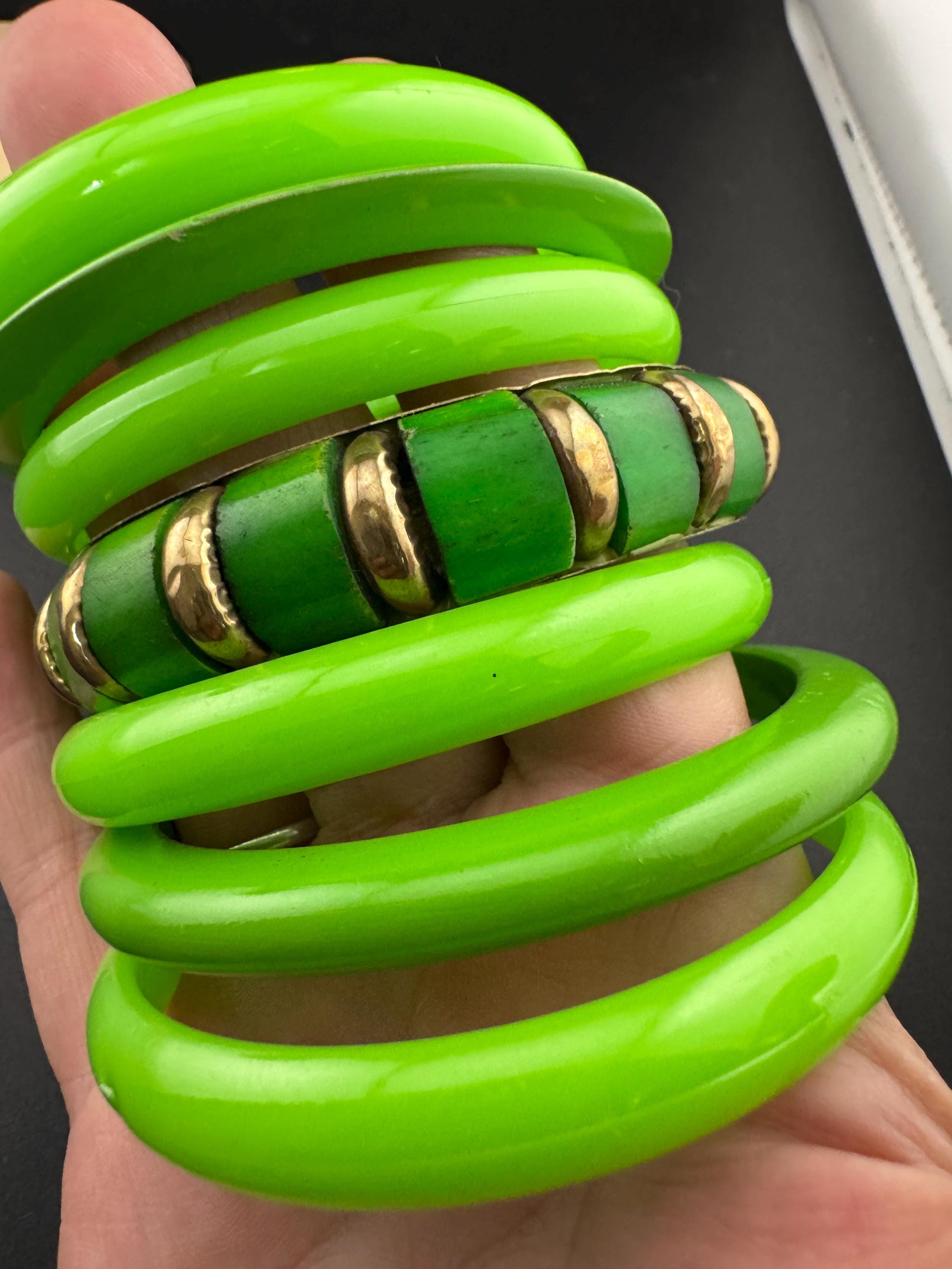 Vintage and retro curated stack of GREEN plastic acrylic bangles, bracelets