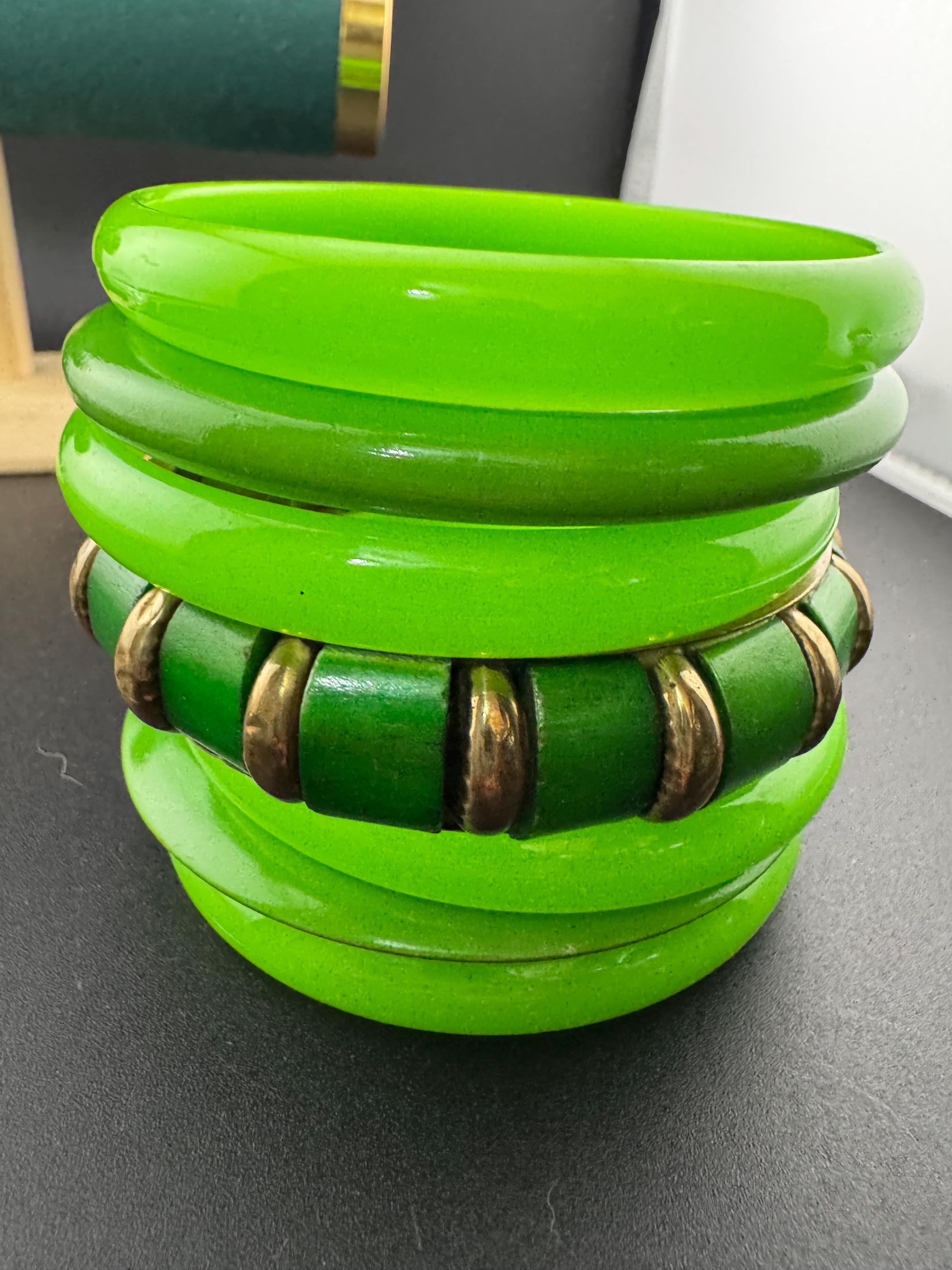 Vintage and retro curated stack of GREEN plastic acrylic bangles, bracelets