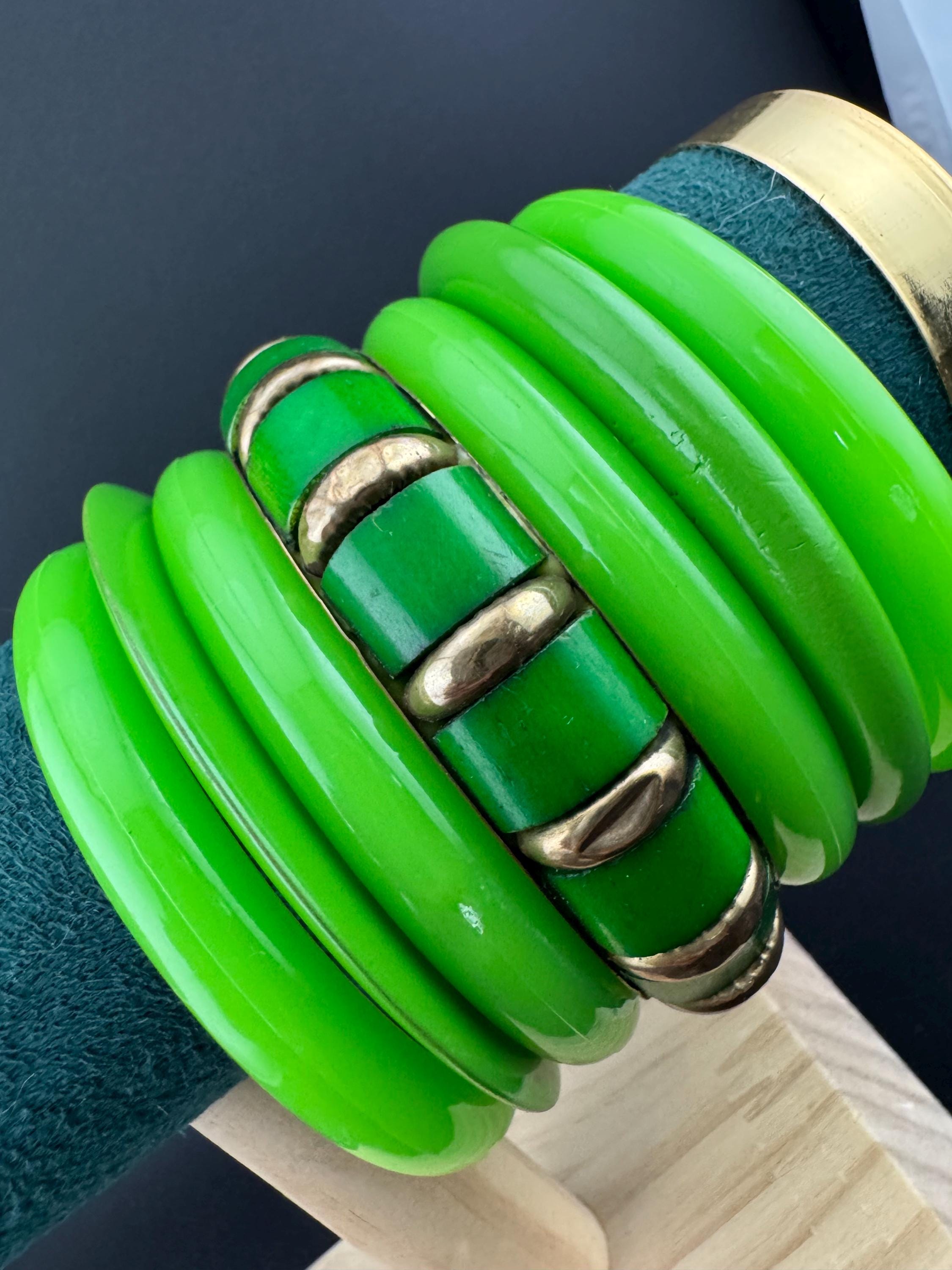 Vintage and retro curated stack of GREEN plastic acrylic bangles, bracelets
