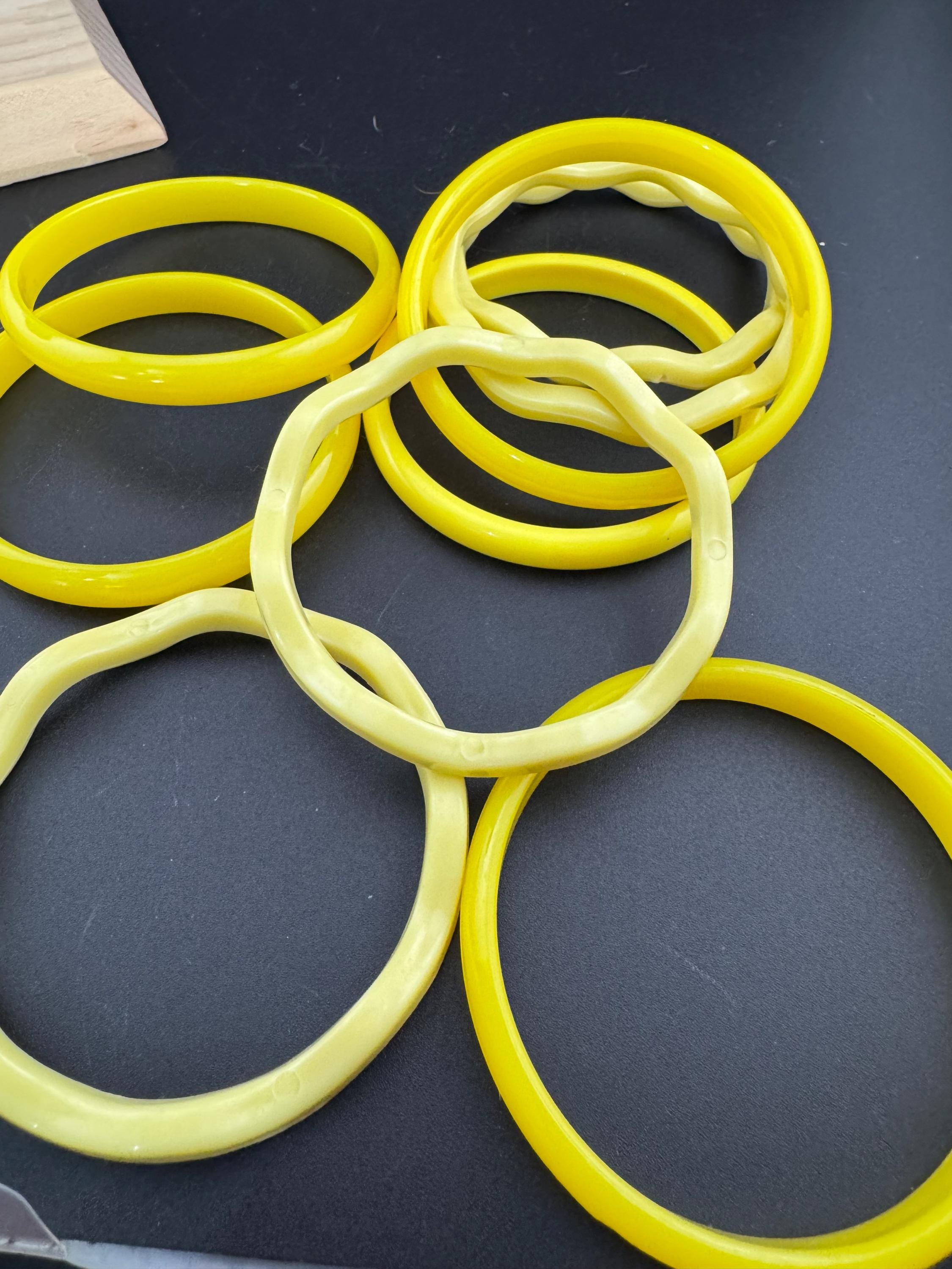 Vintage curated stack of YELLOW plastic bangles retro acrylic bracelets