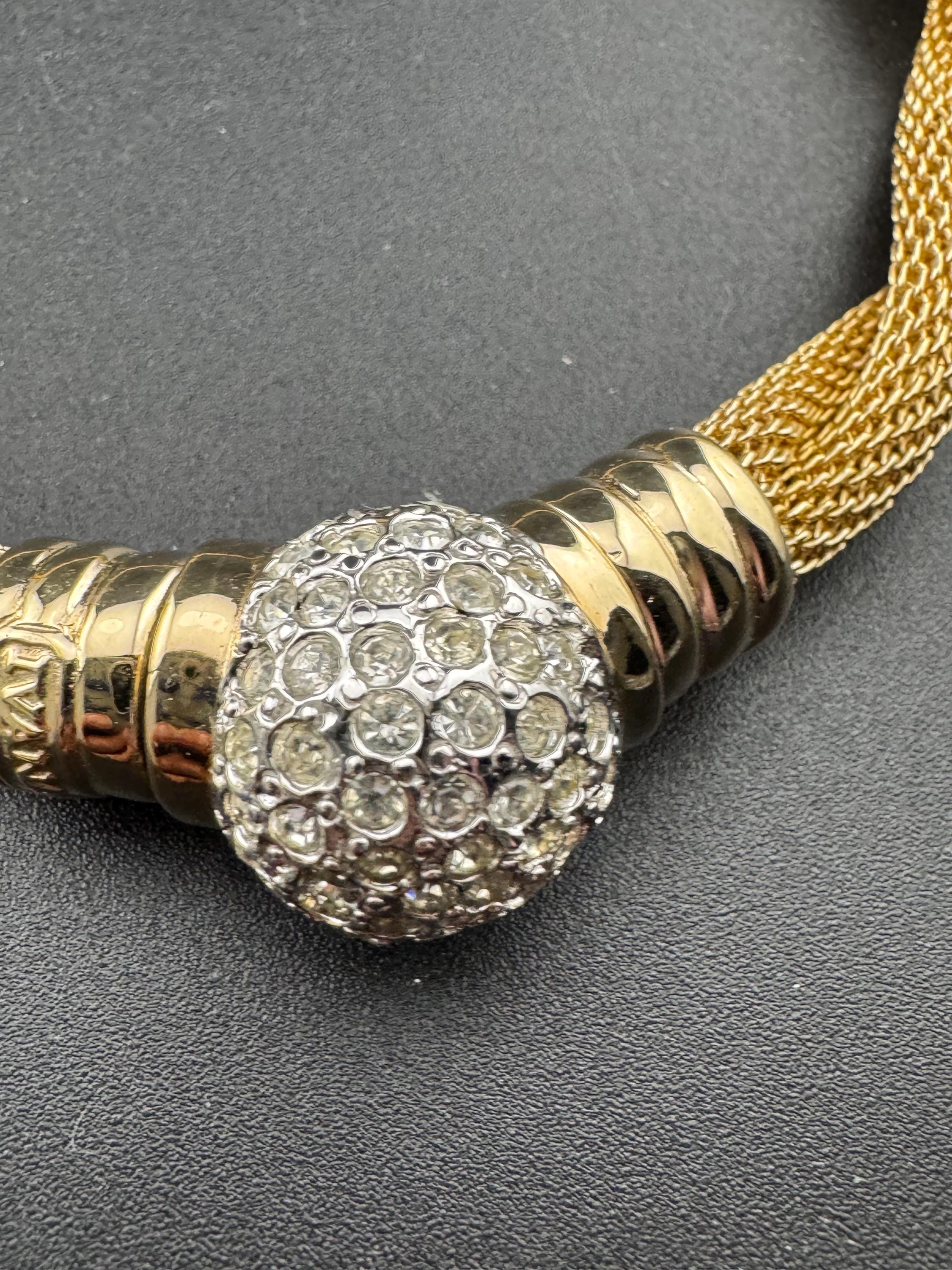 Signed IVANA Trump modernist and versatile gold tone wide mesh choker necklace with clear diamanté detail and popper clasp