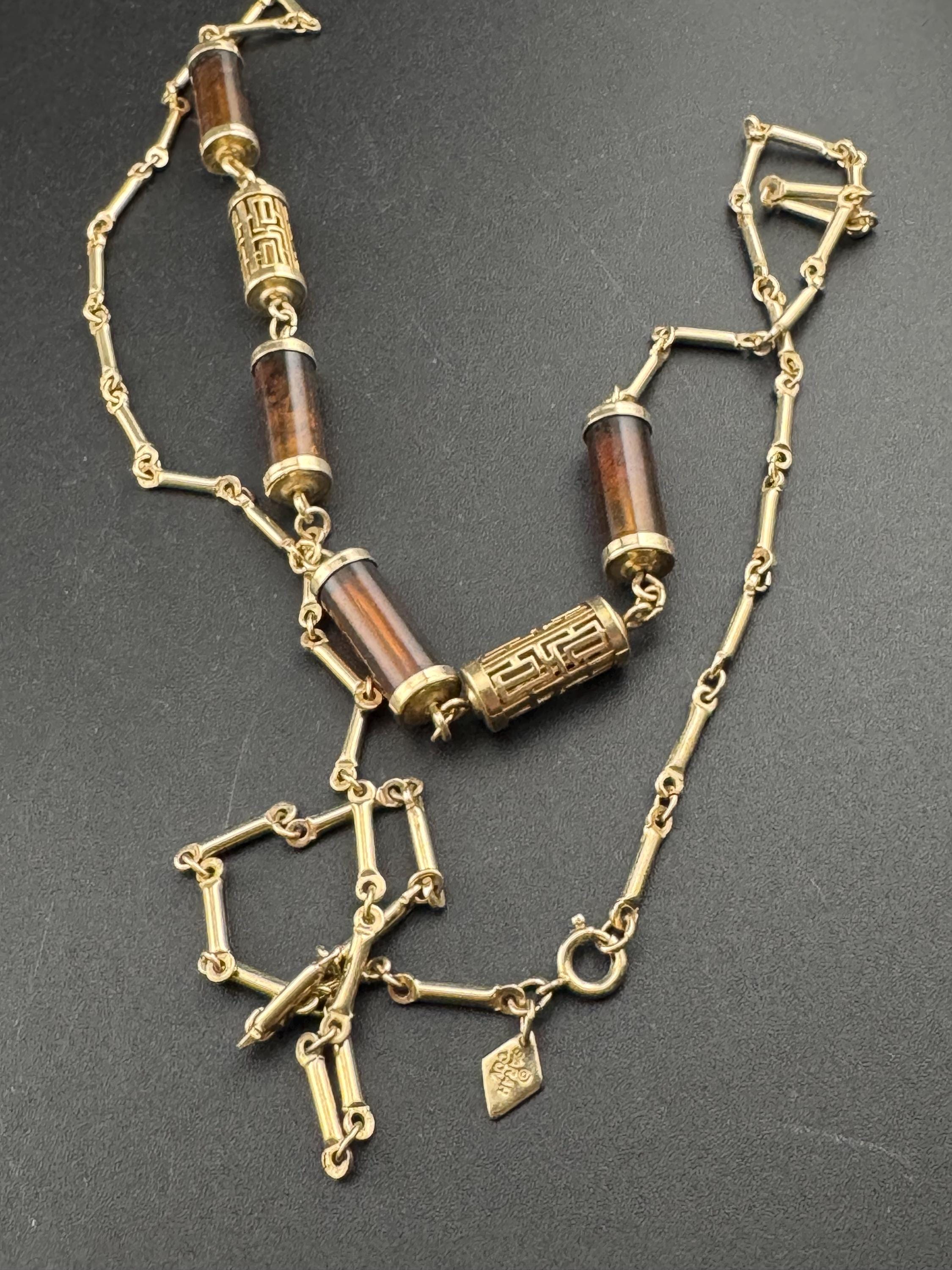 Vintage Sarah Coventry signed long gold tone station Chinese caged brown tube bead chain necklace 1960s 1970s
