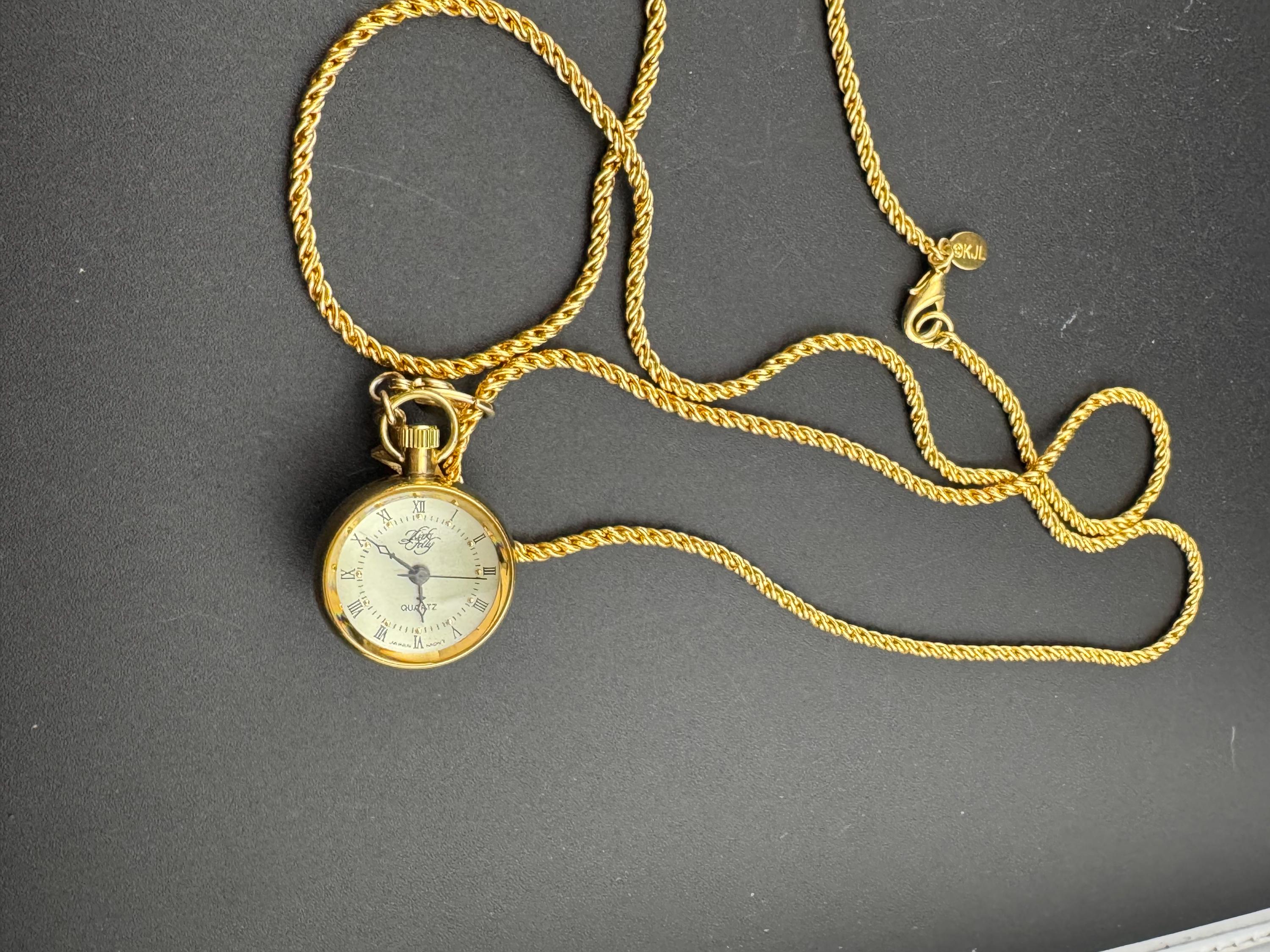 Signed Kirk’s Folly man in the moon ball pendant watch on a 86cm Kenneth lane gold plated long chain