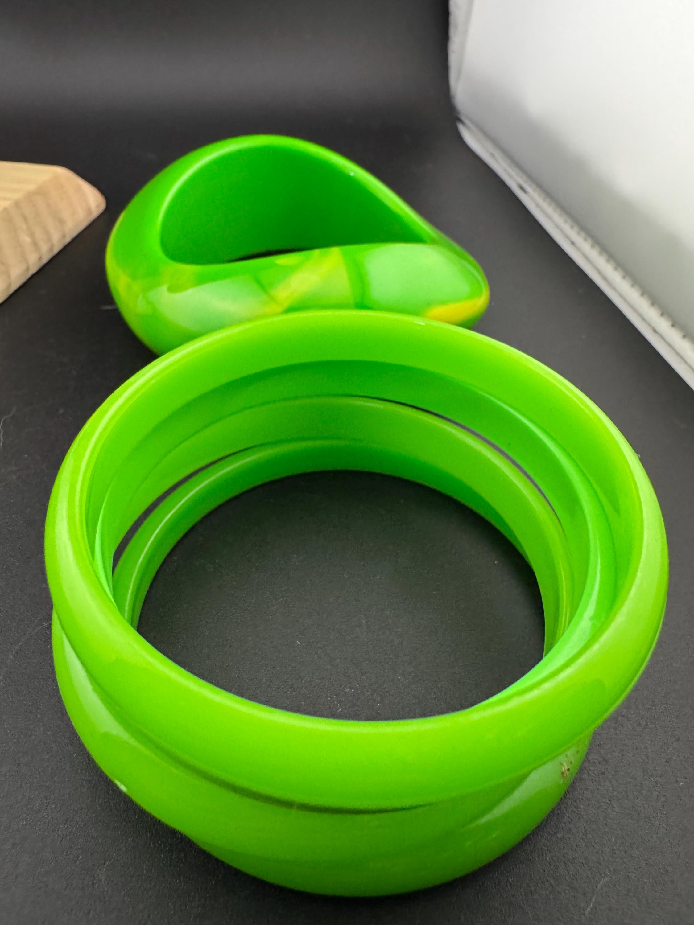 Vintage and retro curated stack of GREEN plastic acrylic bangles, bracelets