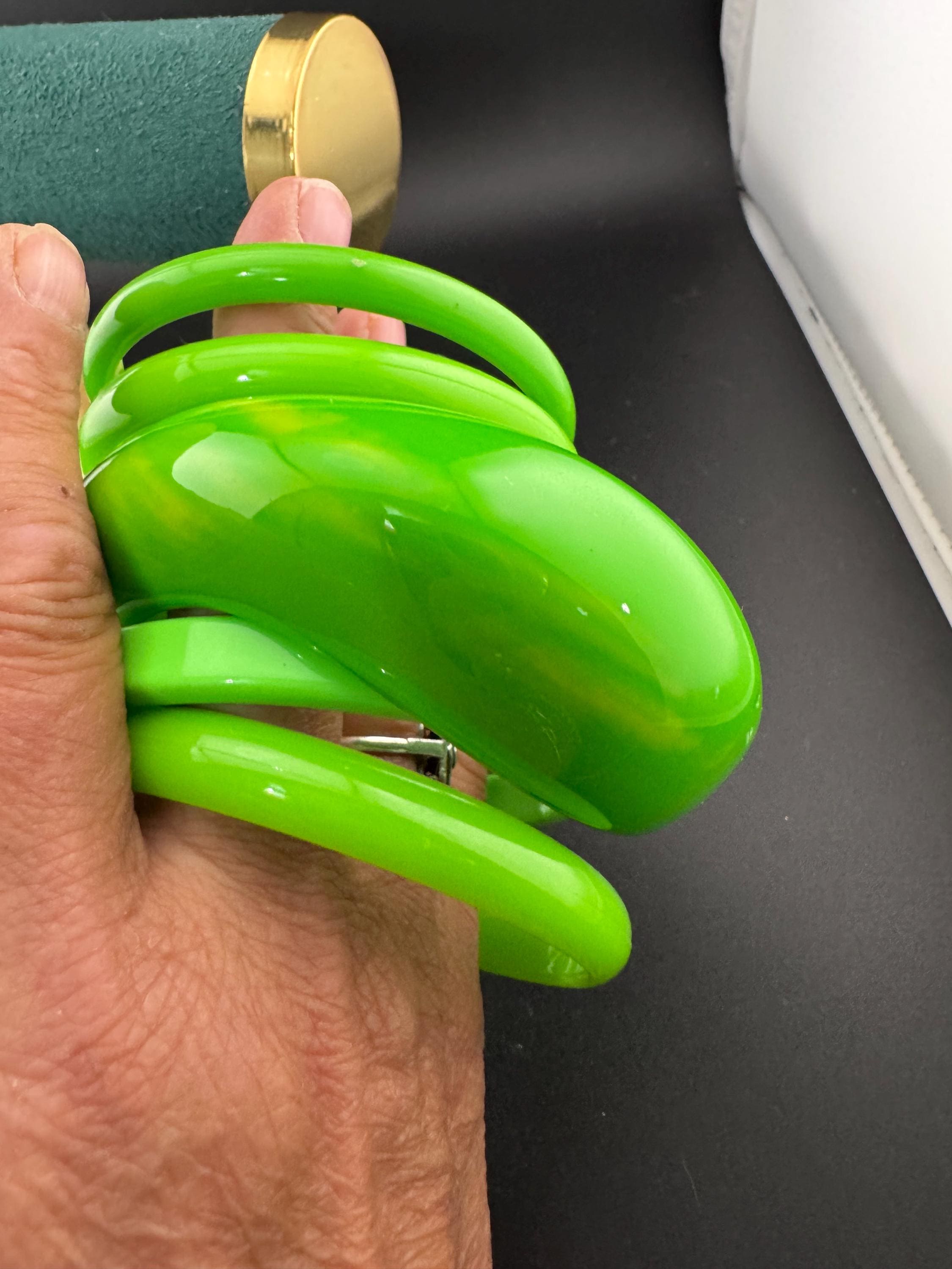 Vintage and retro curated stack of GREEN plastic acrylic bangles, bracelets