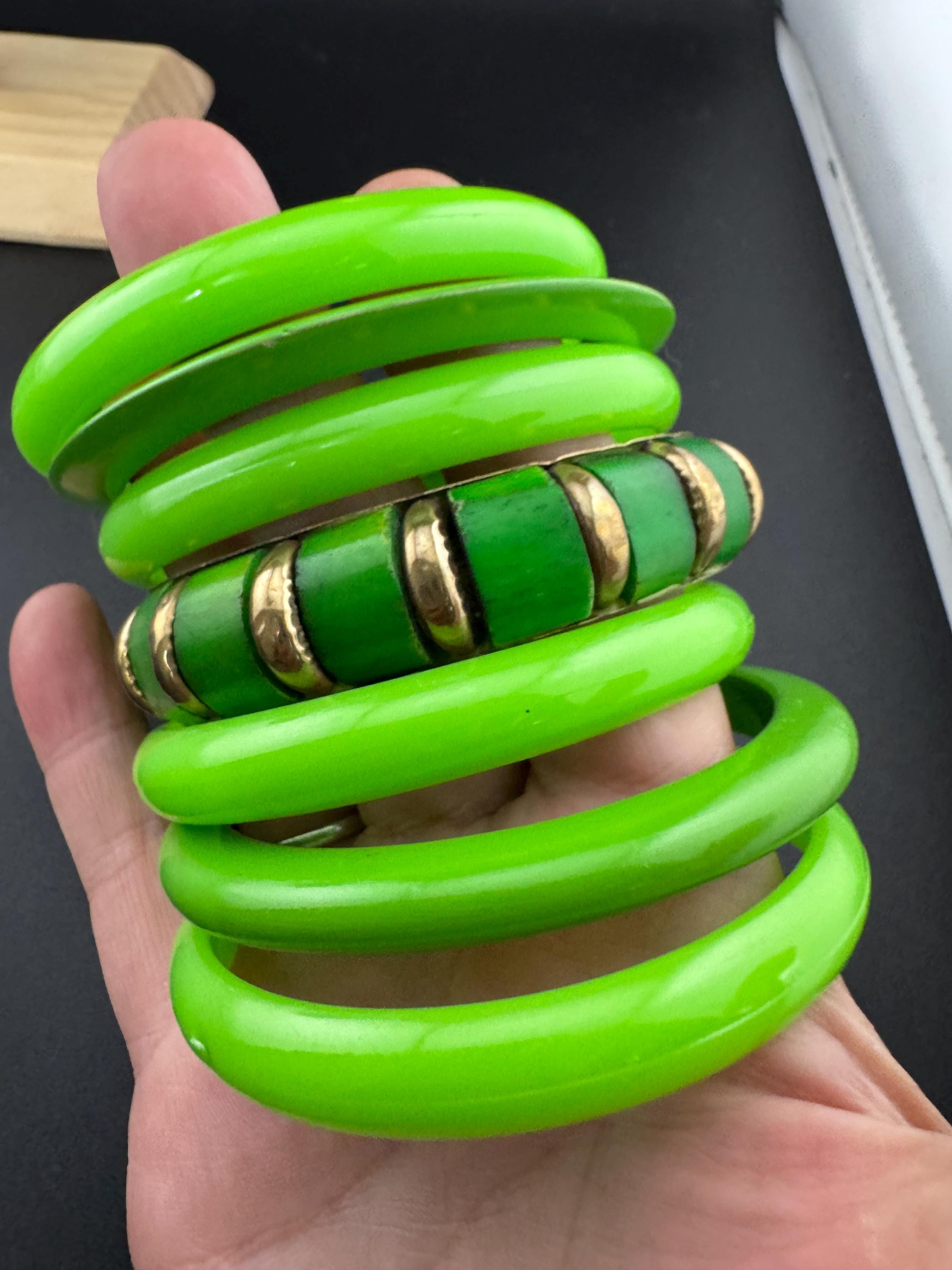 Vintage and retro curated stack of GREEN plastic acrylic bangles, bracelets