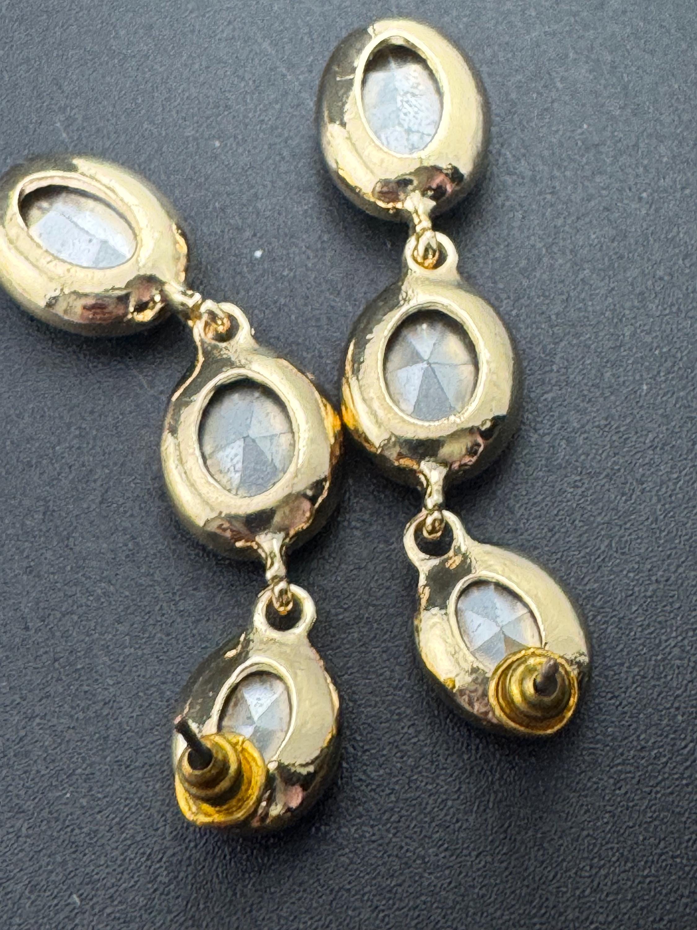 Retro long crystal earrings set with light green, sapphire blue and clear glass stones, heavy gold plated drop for pierced ears