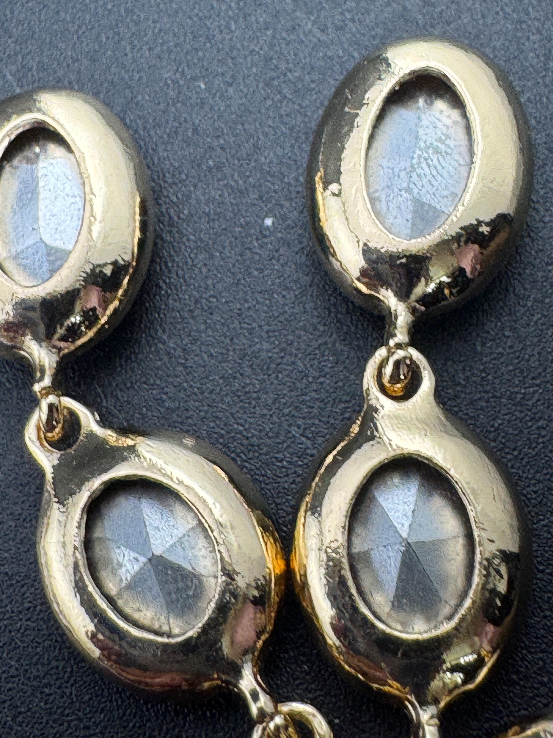 Retro long crystal earrings set with light green, sapphire blue and clear glass stones, heavy gold plated drop for pierced ears