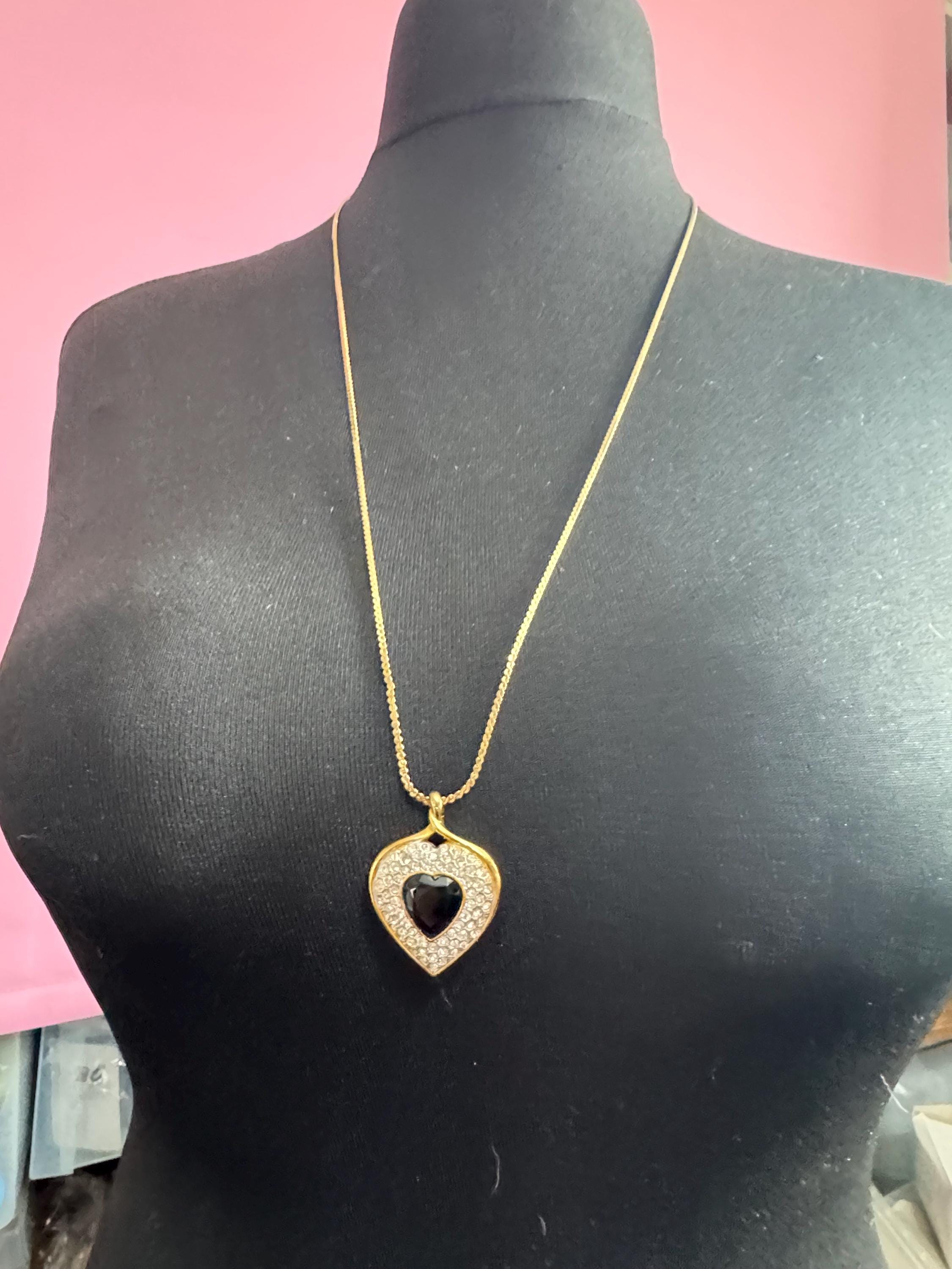 Signed Sphinx black glass crystal love heart diamanté pendant necklace on a long gold plated serpentine chain