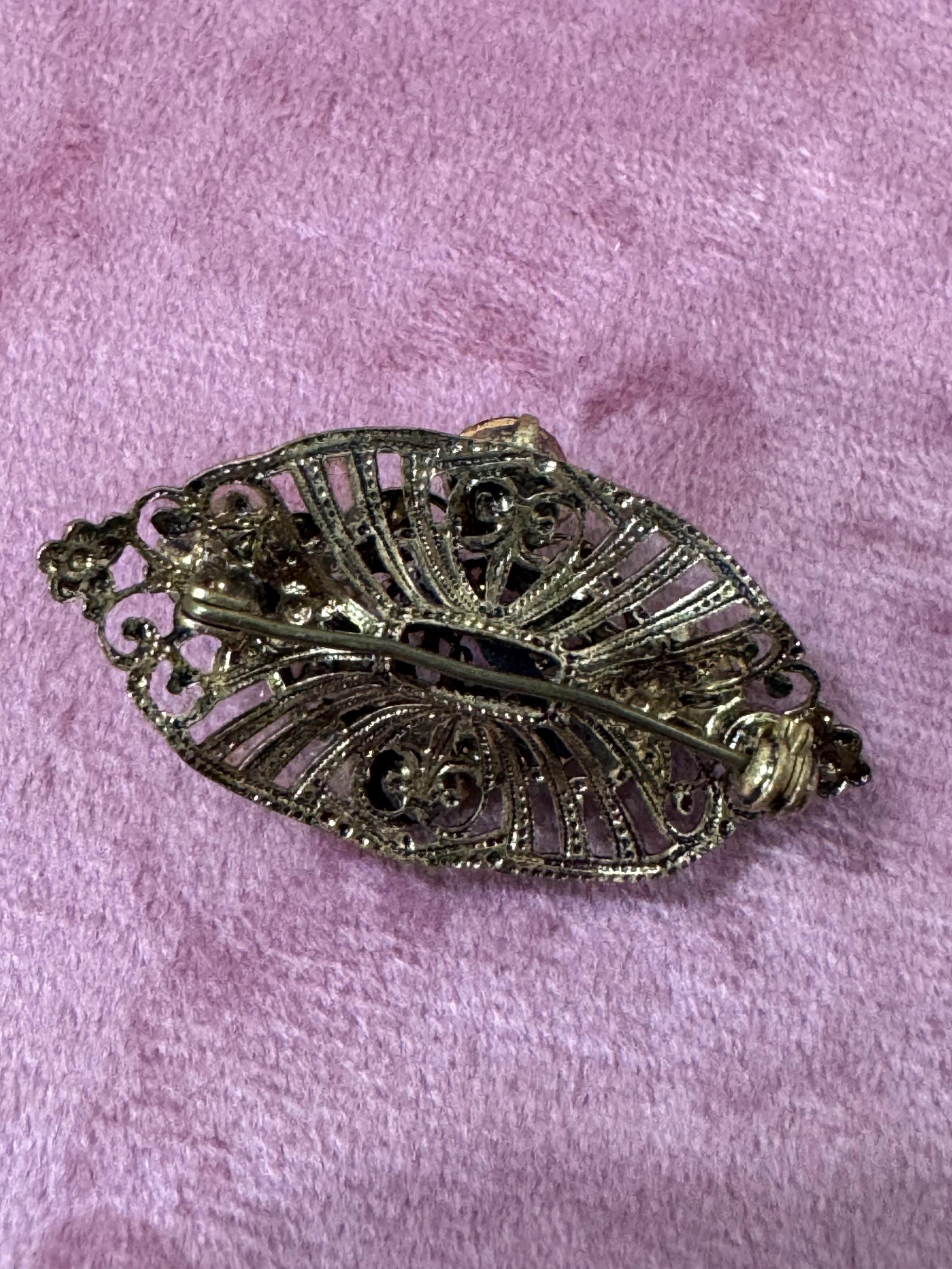 Antique Art Deco Czech brass gilt metal filigree brooch with red faux ruby glass paste rhinestones ornate