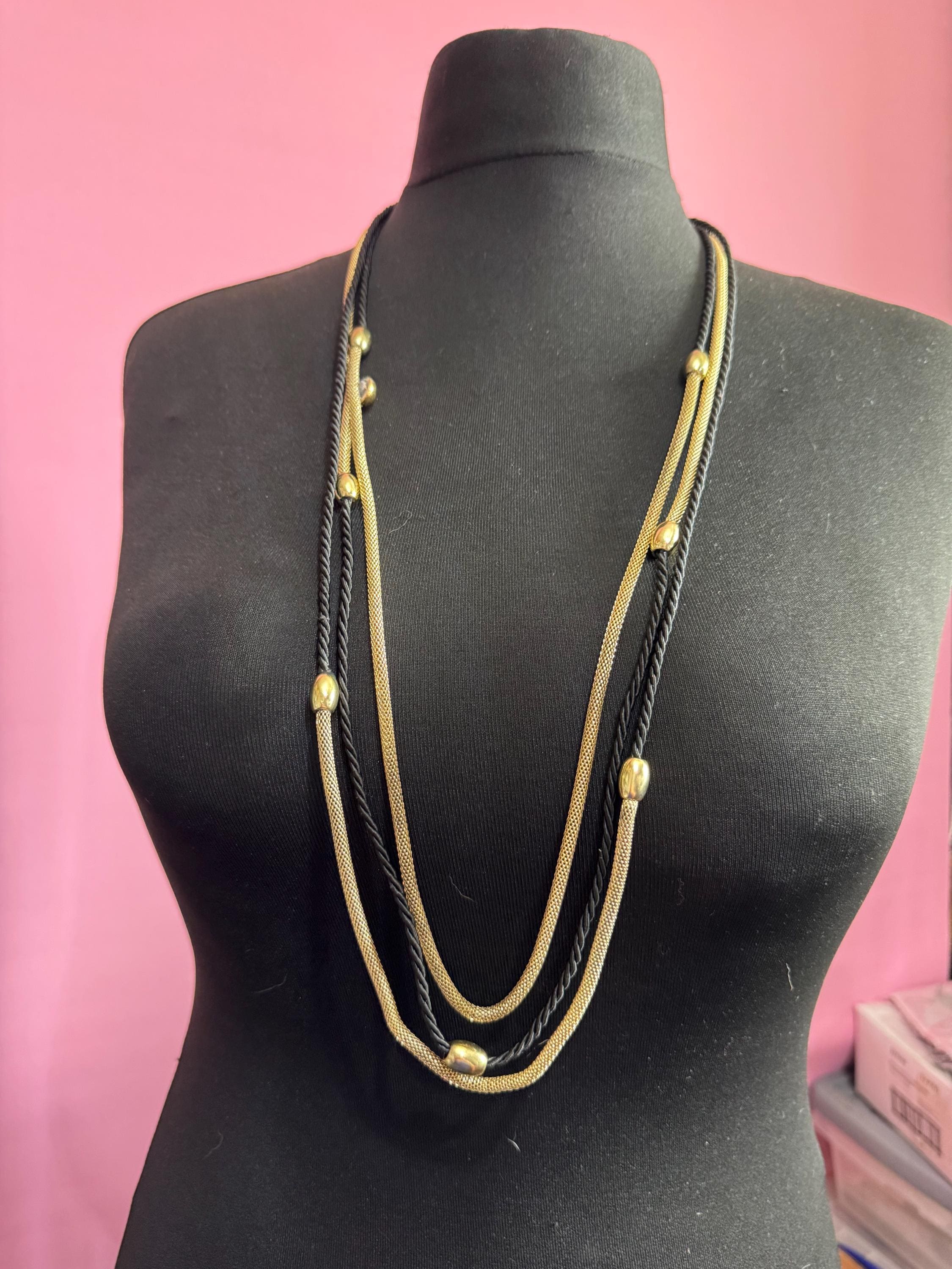 Vintage long round tube mesh link antique gold tone and black cord beaded Multistrand wrap necklace