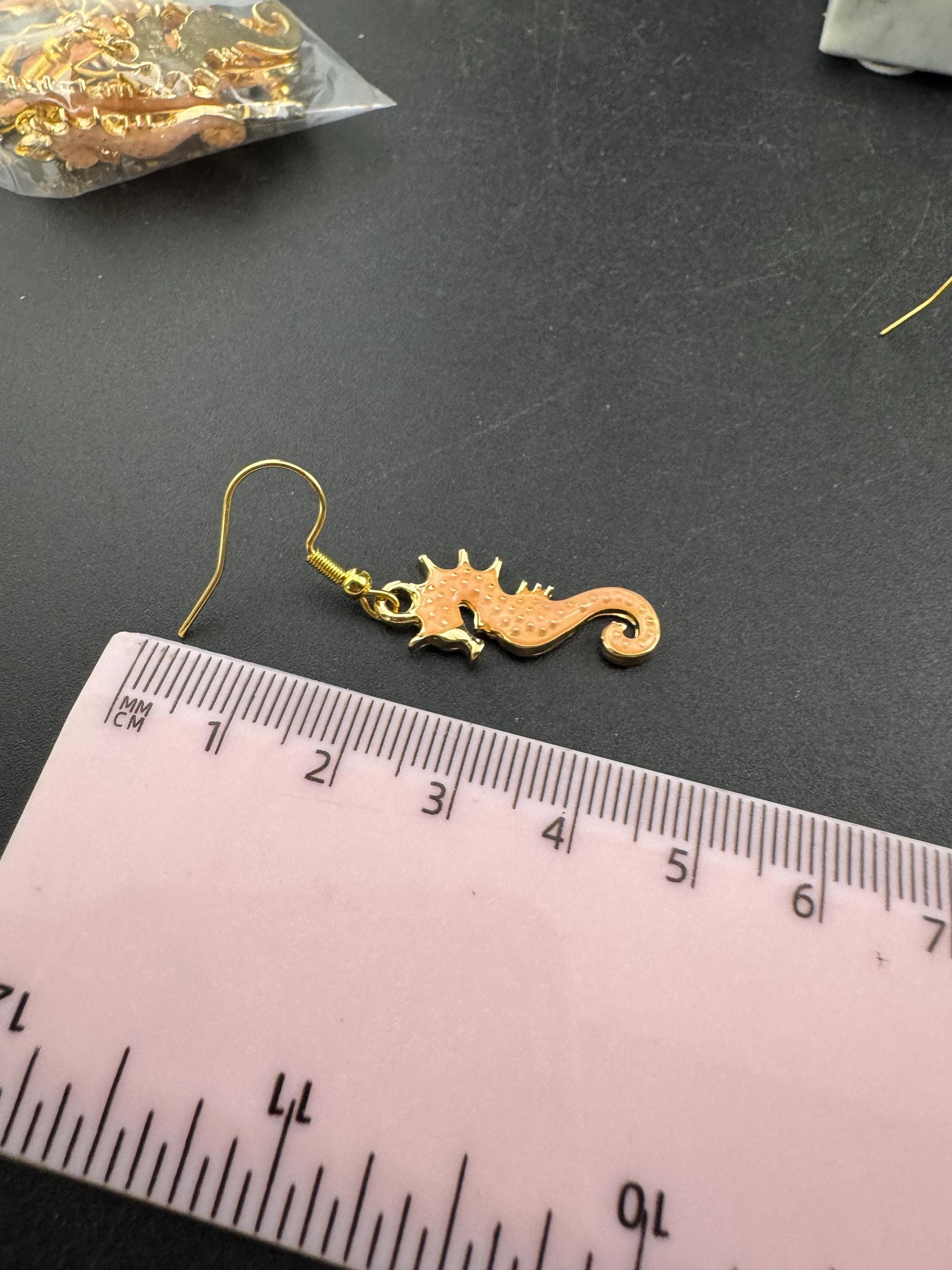 Soft pink enamel nautical seahorse earrings for pierced ears, Gold tone marine life