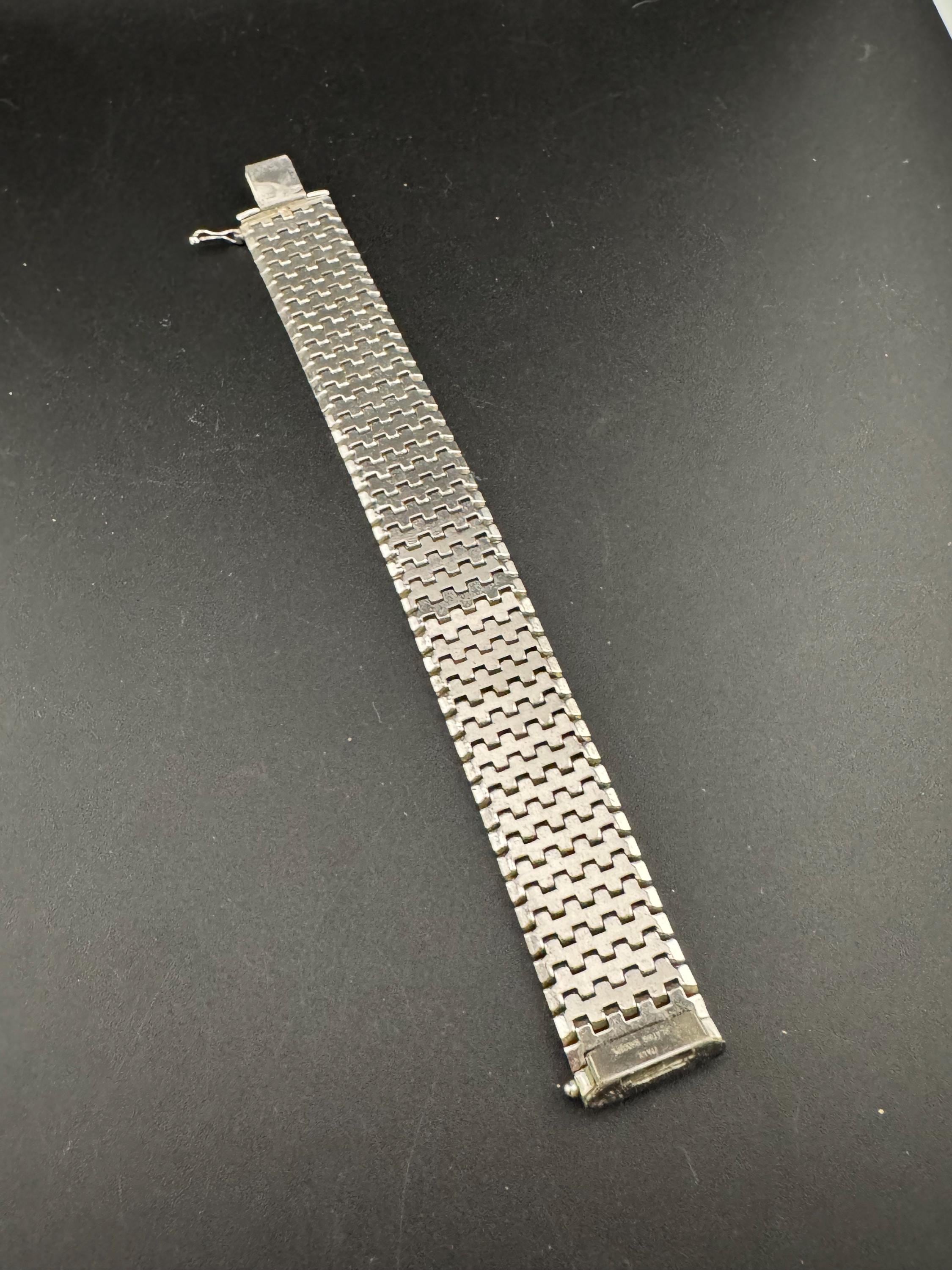 1970s Italian rhodium plated articulated textured modernist 22mm wide silver tone flat bracelet 19.5cm