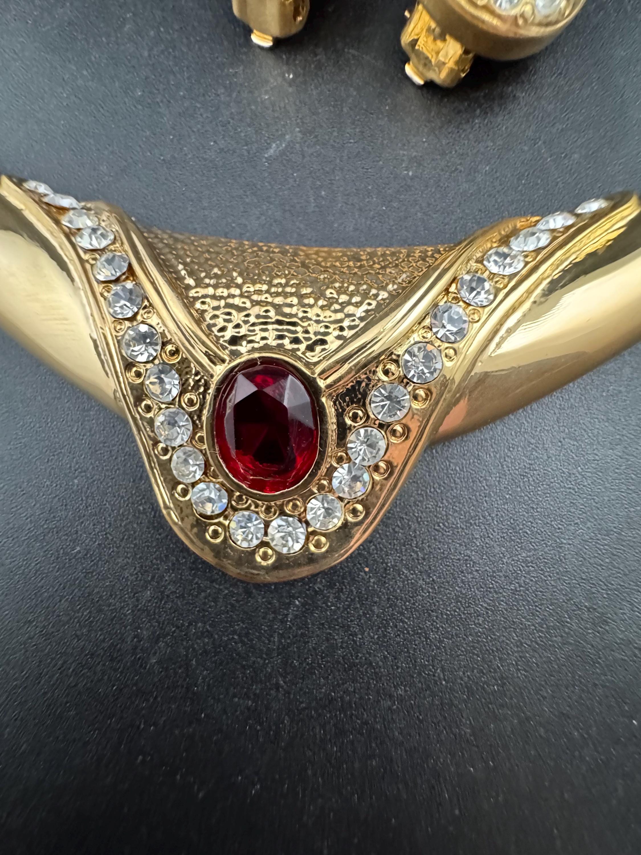 vintage 1980s high end ruby red and clear crystal gold choker necklace and matching clip on earrings, unused retro jewelry set