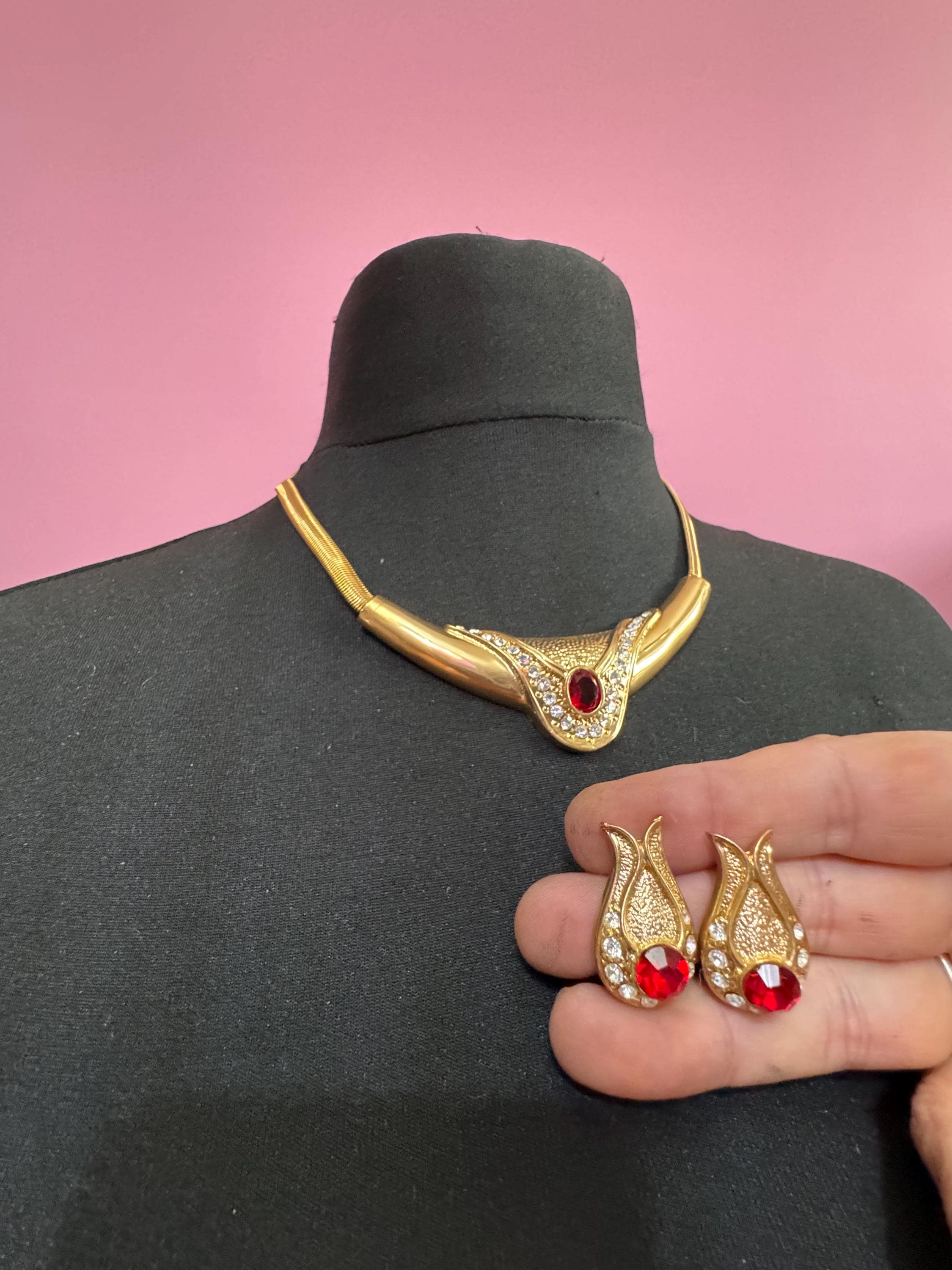 vintage 1980s high end ruby red and clear crystal gold choker necklace and matching clip on earrings, unused retro jewelry set