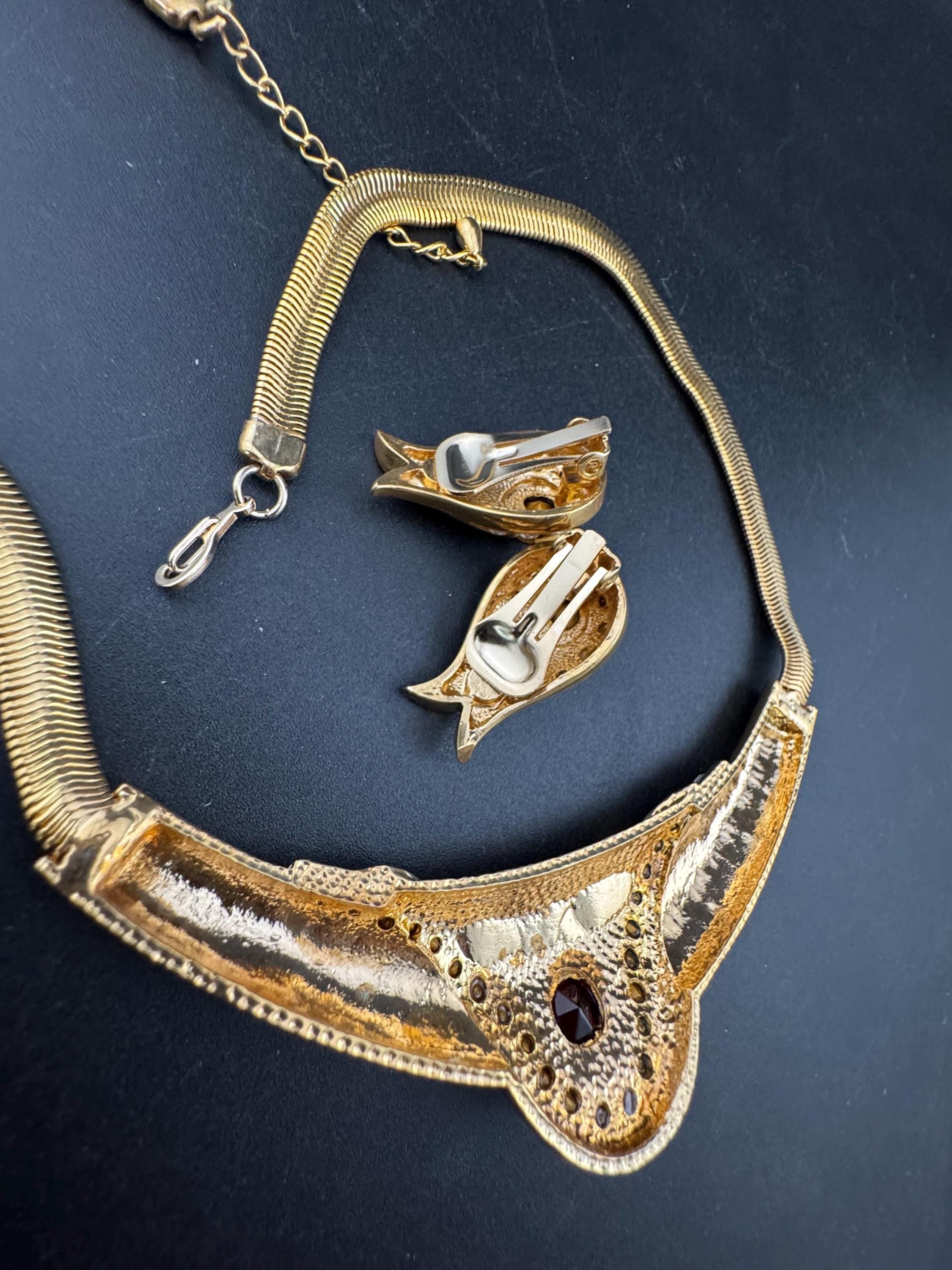 vintage 1980s high end ruby red and clear crystal gold choker necklace and matching clip on earrings, unused retro jewelry set
