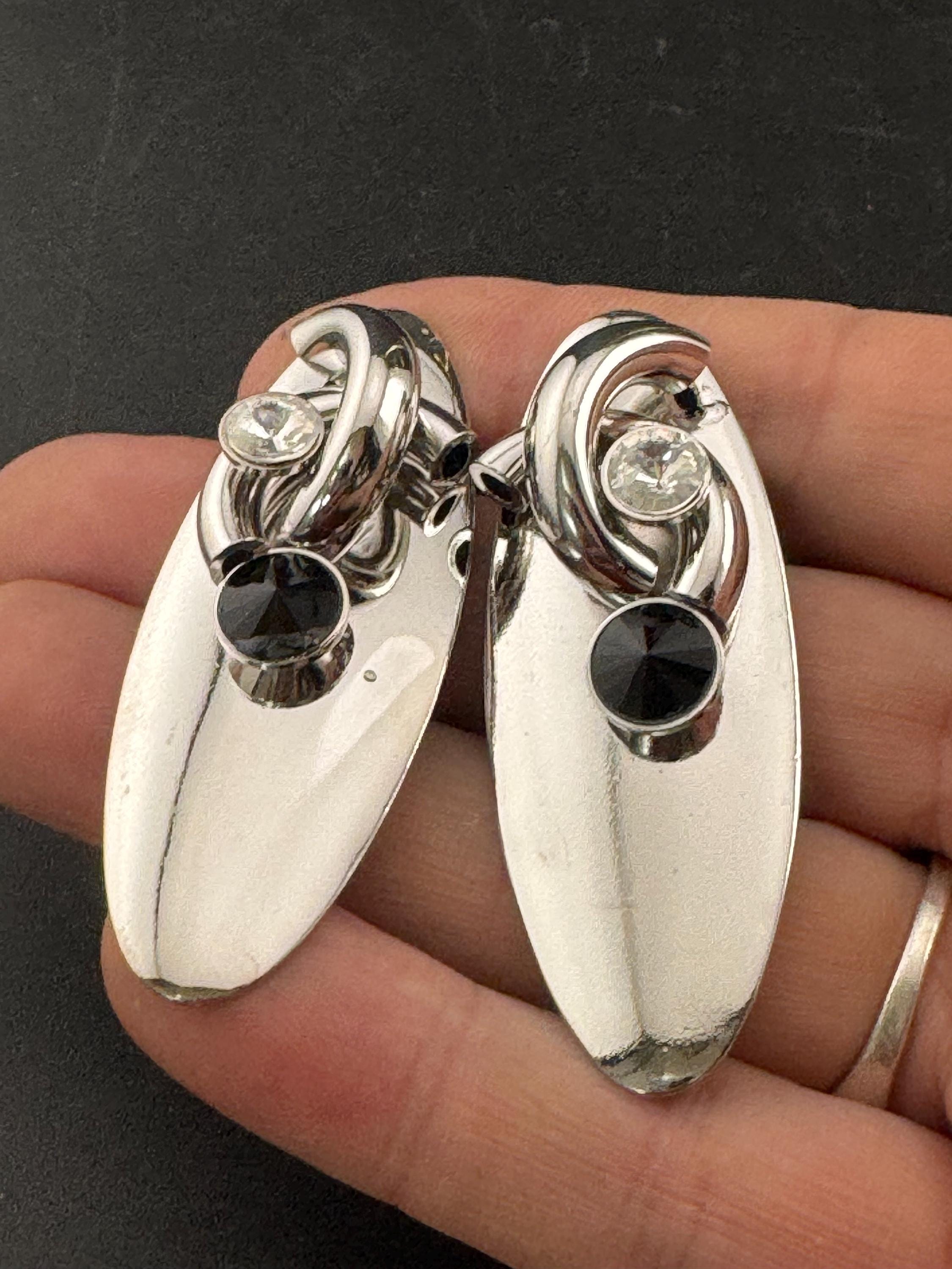 Vintage modernist silver tone high sheen 1980s long drop earrings set with black crystal and metal tube work for pierced ears
