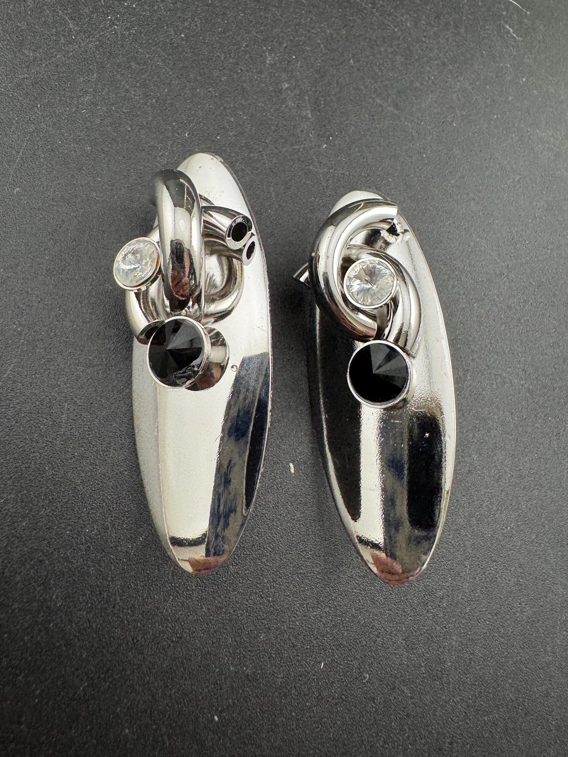 Vintage modernist silver tone high sheen 1980s long drop earrings set with black crystal and metal tube work for pierced ears