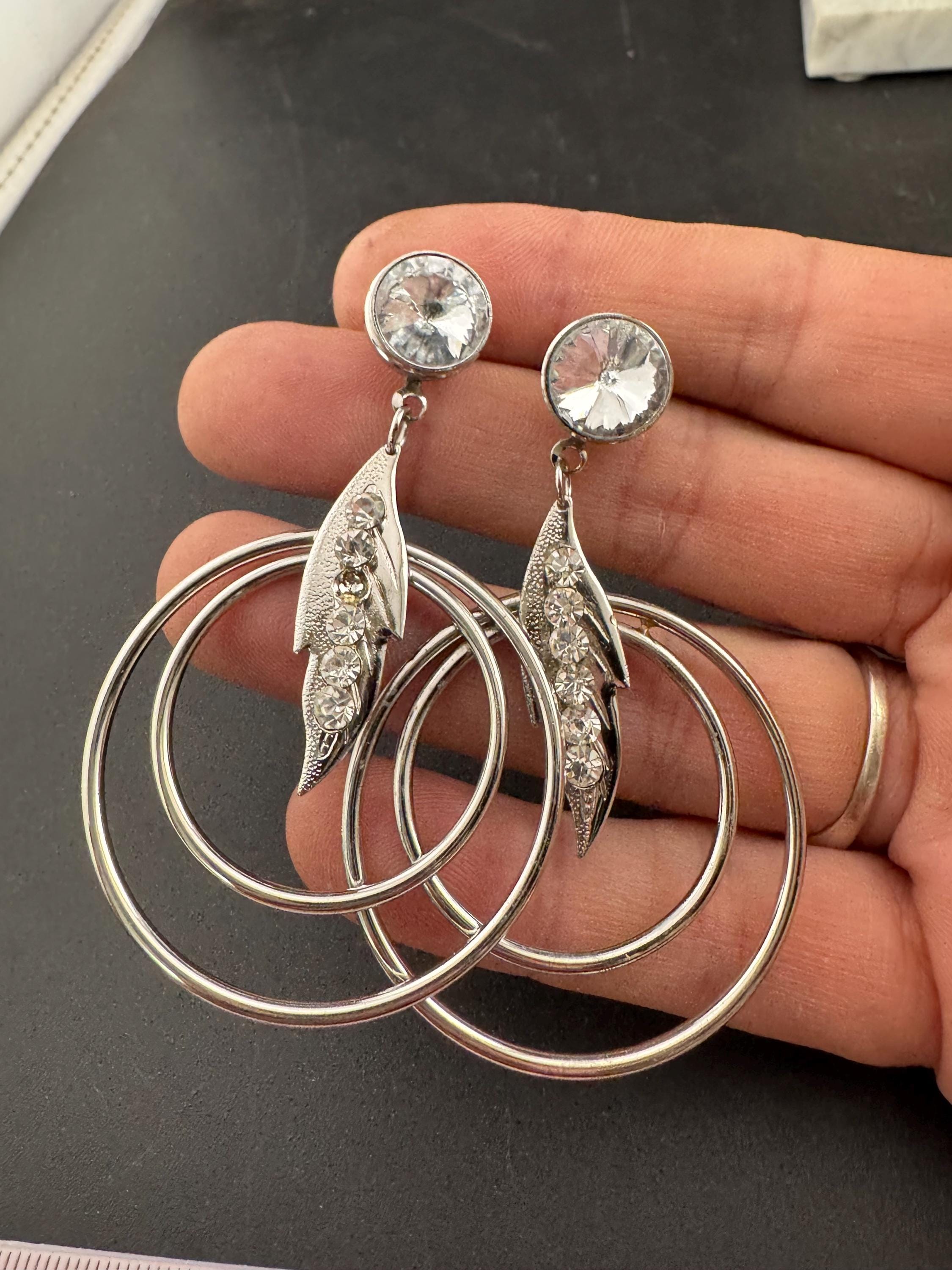 Vintage modernist silver tone 1980s big hoop drop earrings set with clear crystal and metal rings for pierced ears