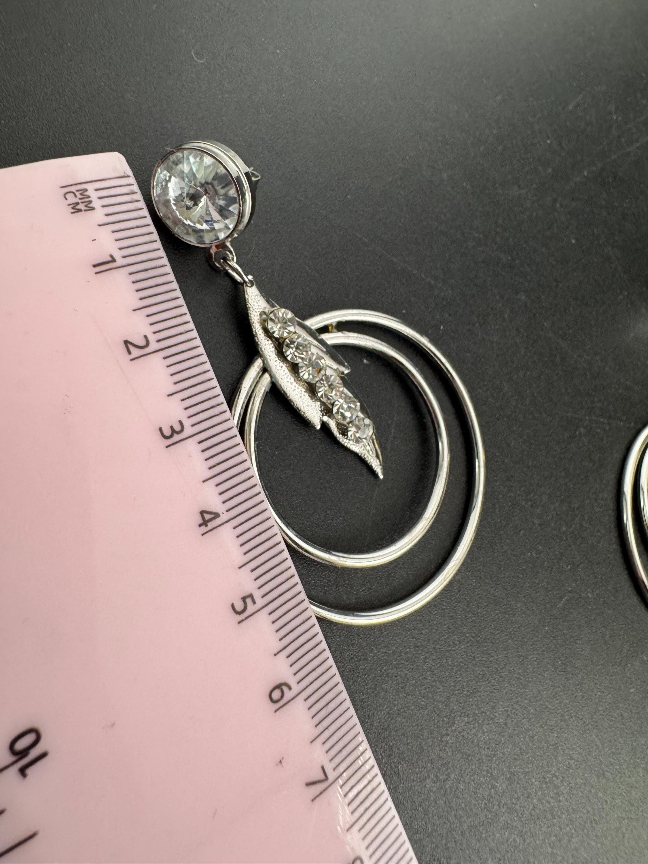 Vintage modernist silver tone 1980s big hoop drop earrings set with clear crystal and metal rings for pierced ears