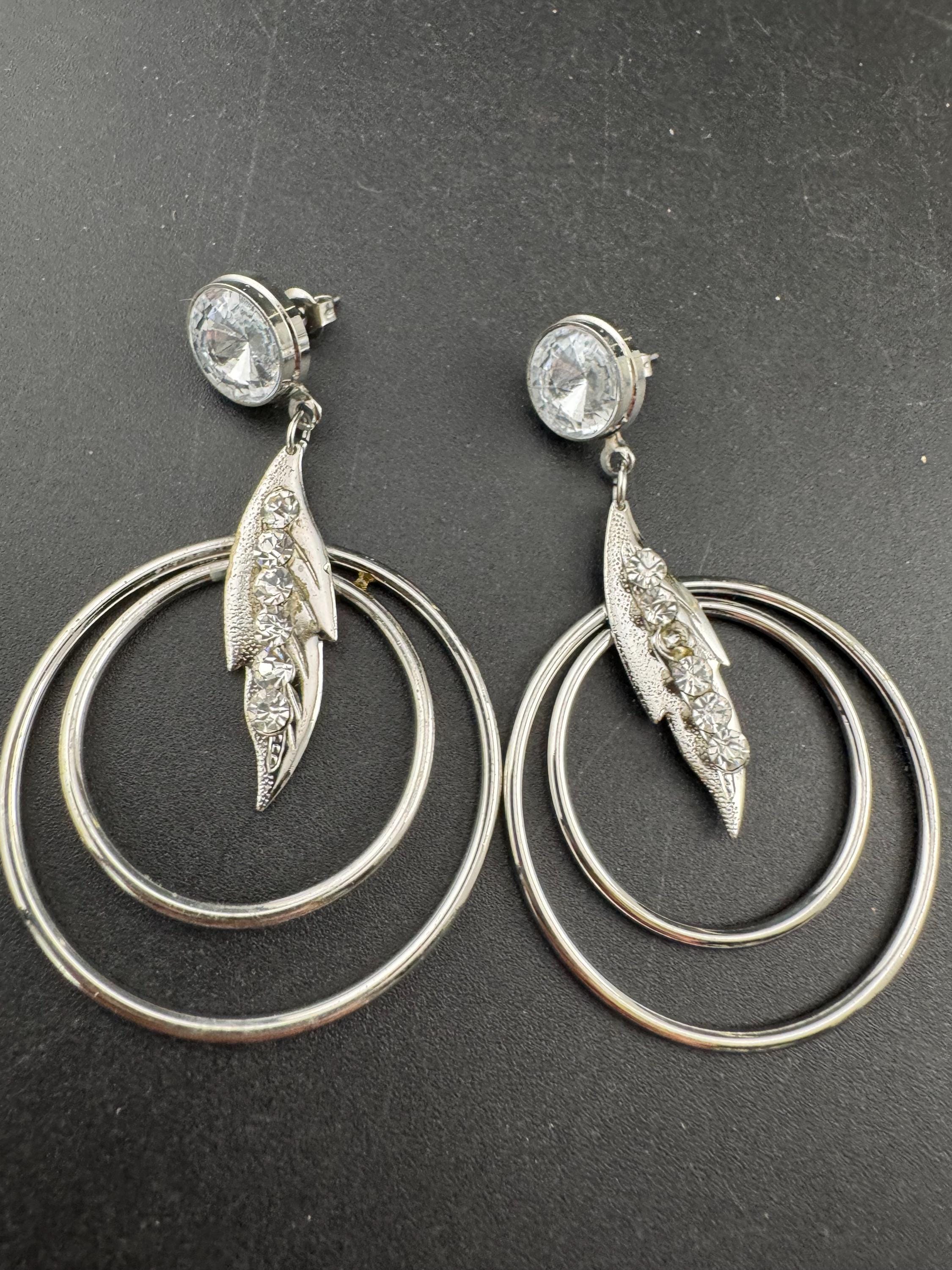 Vintage modernist silver tone 1980s big hoop drop earrings set with clear crystal and metal rings for pierced ears