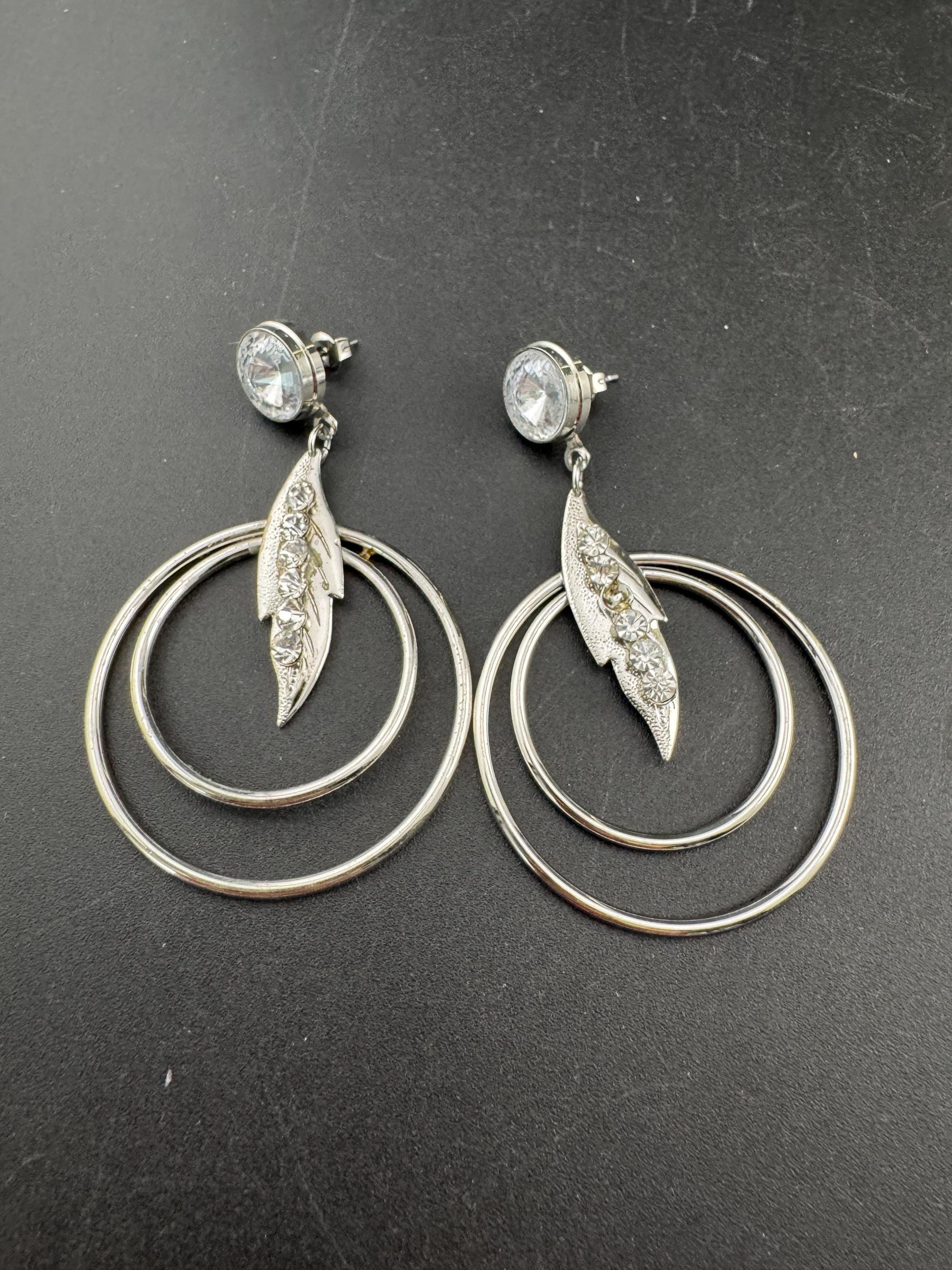 Vintage modernist silver tone 1980s big hoop drop earrings set with clear crystal and metal rings for pierced ears